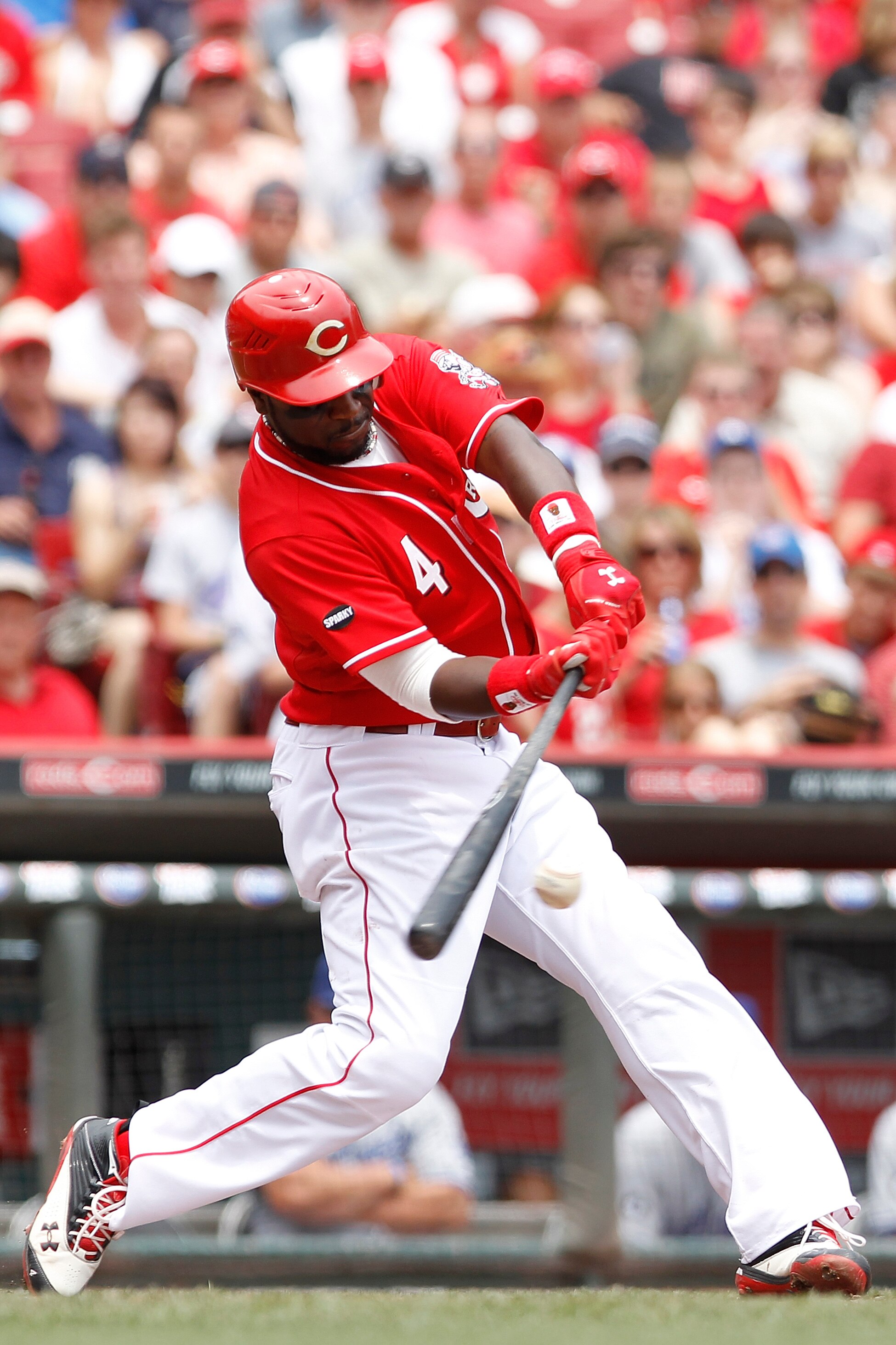 CINCINNATI, OH - JUNE 5: Brandon Phillips #4 of the Cincinnati Reds singles in the second inning to drive in two runs against the Los Angeles Dodgers at Great American Ball Park on June 5, 2011 in Cincinnati, Ohio. (Photo by Joe Robbins/Getty Images)