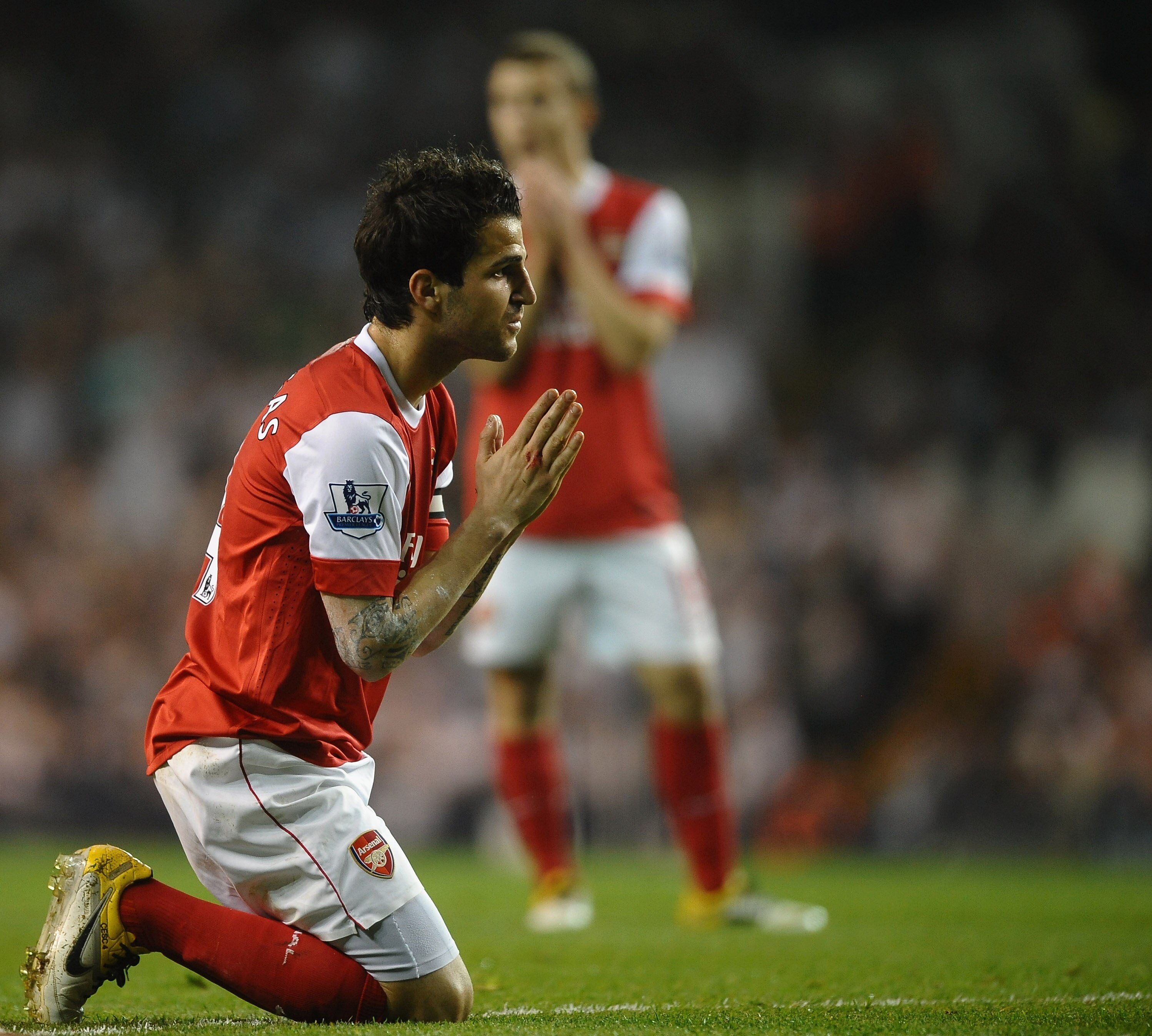 LONDON, ENGLAND - APRIL 20:  Cesc Fabregas of Arsenal reacts during the Barclays Premier League match between Tottenham Hotspur and Arsenal at White Hart Lane on April 20, 2011 in London, England.  (Photo by Laurence Griffiths/Getty Images)