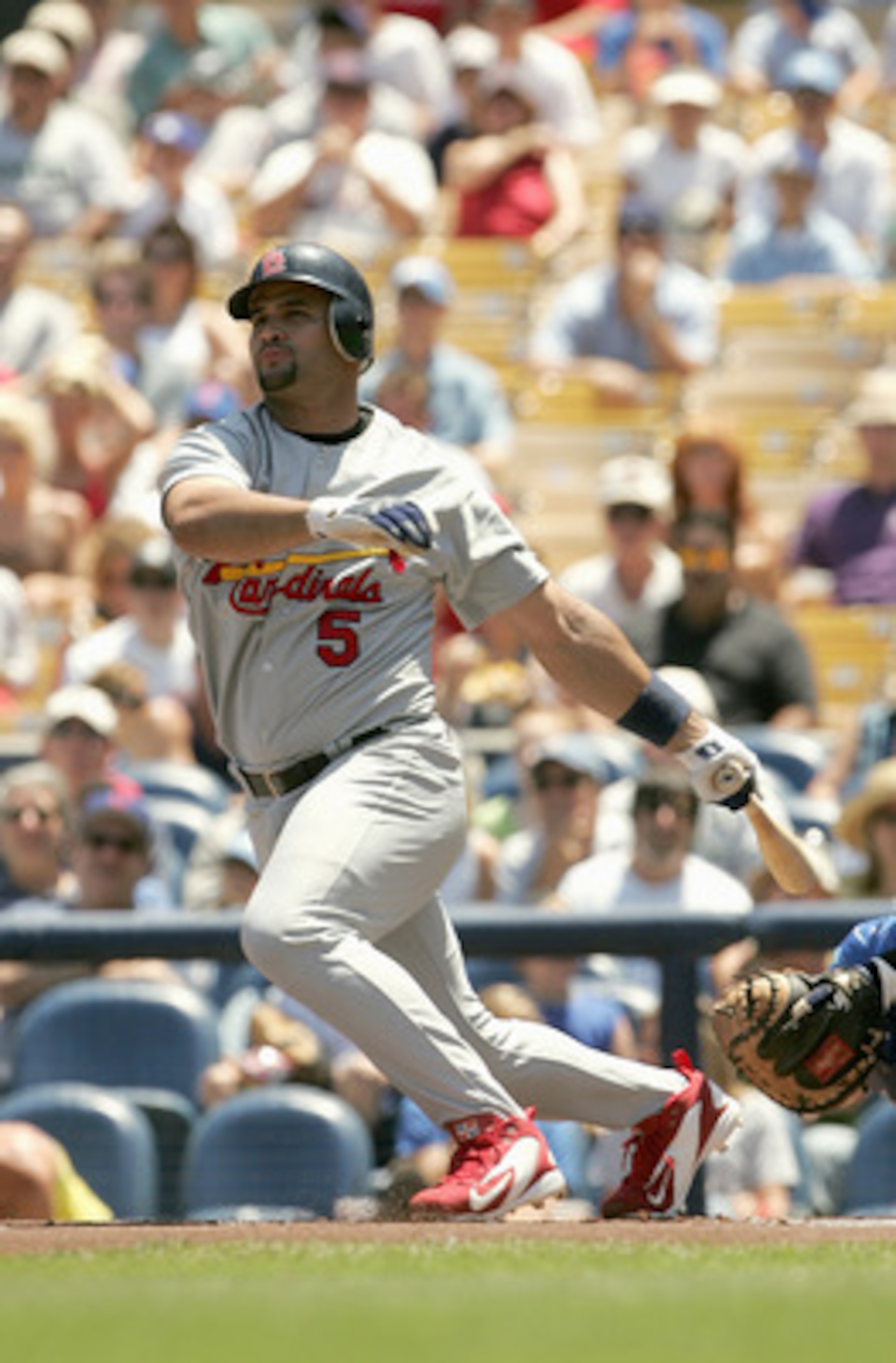 LOS ANGELES - JULY 31:  Albert Pujols #5 of the St. Louis Cardinals bats during the game against the Los Angeles Dodgers on July 31, 2005 at Dodger Stadium in Los Angeles, California.  The Cardinals won 7-5 in 11 innings.  (Photo by Stephen Dunn /Getty Im