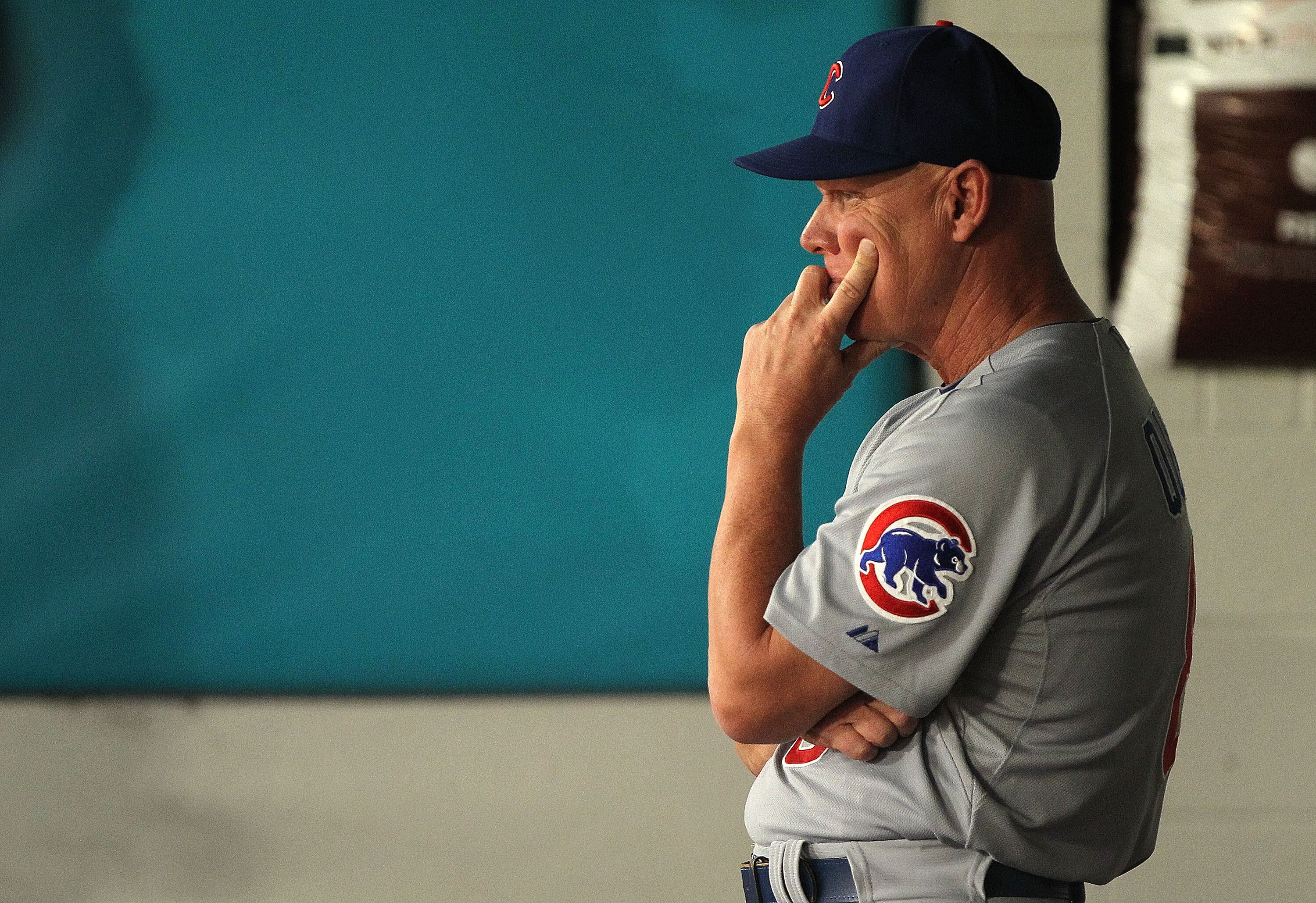 MIAMI GARDENS, FL - MAY 19:   Chicago Cubs manager Mike Quade #8 looks on during a game against  the Florida Marlins at Sun Life Stadium on May 19, 2011 in Miami Gardens, Florida.  (Photo by Mike Ehrmann/Getty Images)