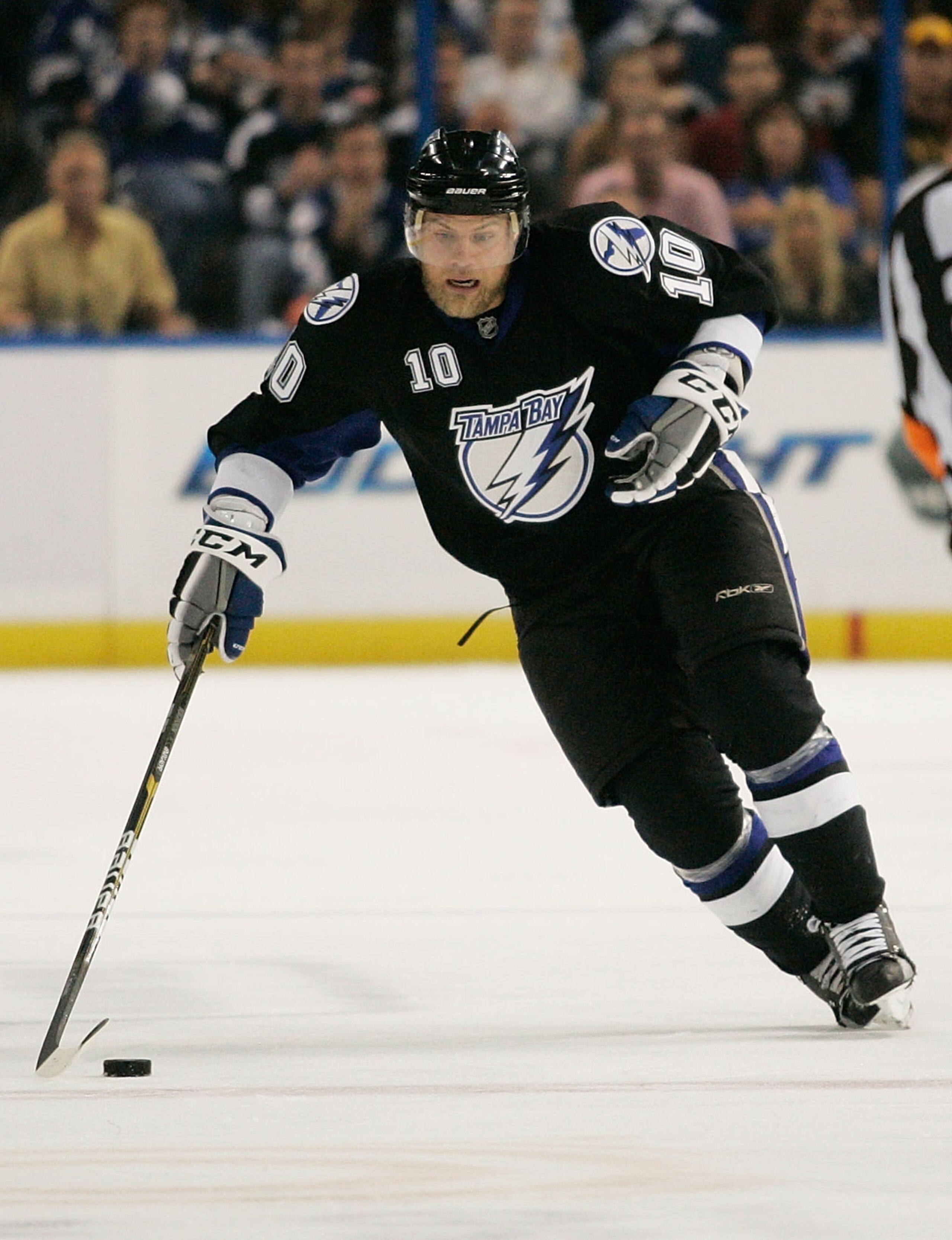 TAMPA, FL - MAY 21:  Sean Bergenheim #10 of the Tampa Bay Lightning controls the puck in Game Four of the Eastern Conference Finals against the Boston Bruins during the 2011 NHL Stanley Cup Playoffs at St Pete Times Forum on May 21, 2011 in Tampa, Florida