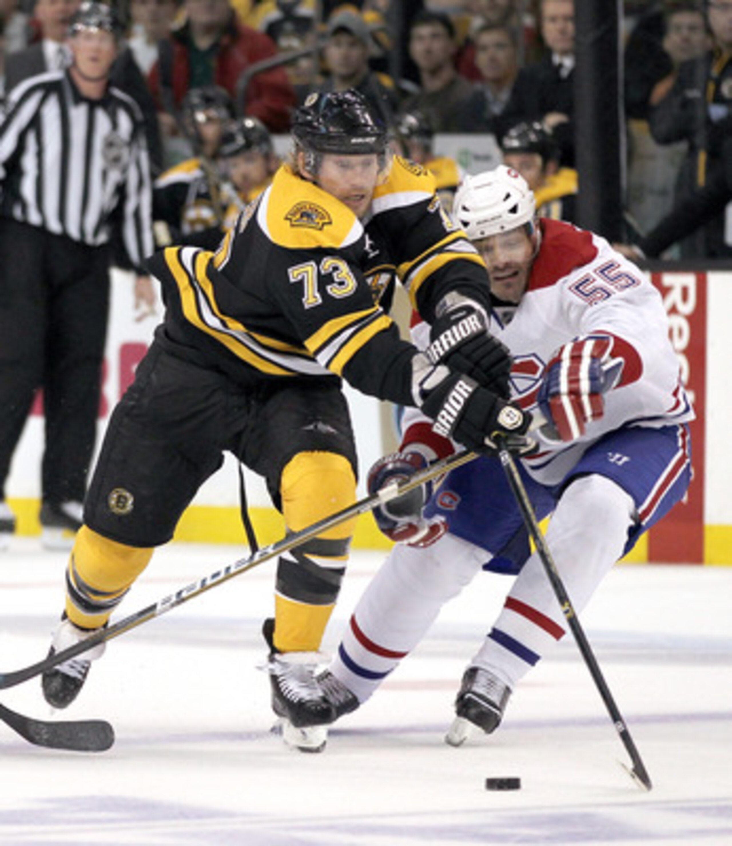 BOSTON, MA - APRIL 27:  Michael Ryder #73 of the Boston Bruins battles Brent Sopel #55 of the Montreal Canadiens in Game Seven of the Eastern Conference Quarterfinals during the 2011 NHL Stanley Cup Playoffs at TD Garden on April 27, 2011 in Boston, Massa