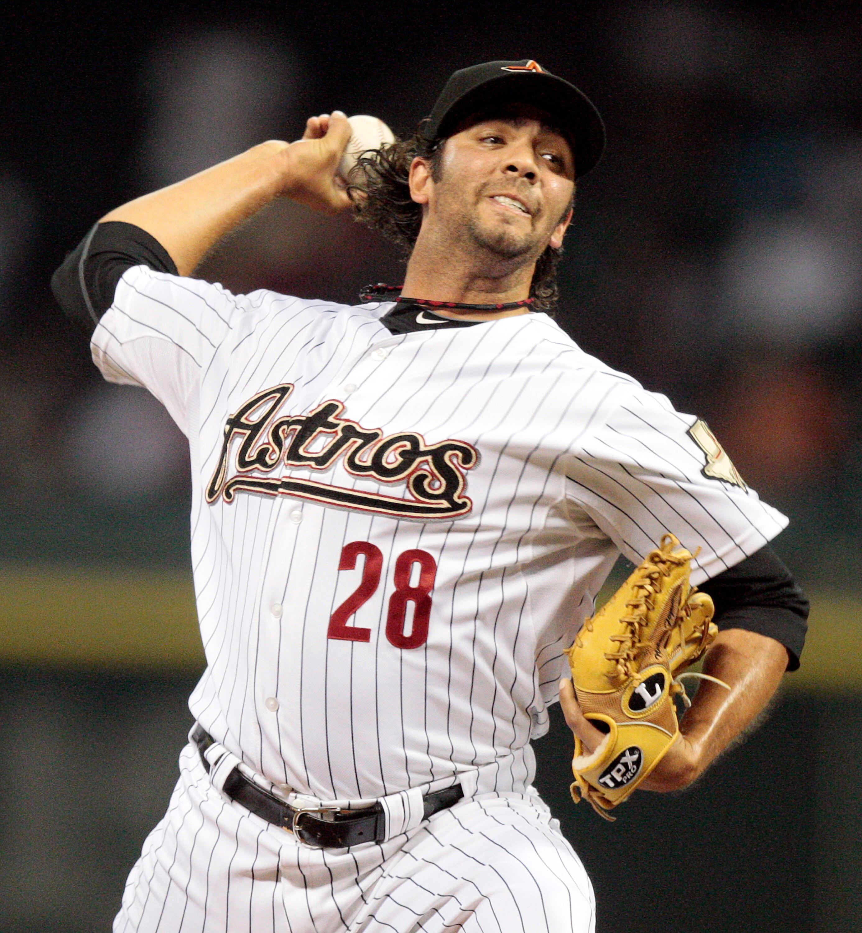 HOUSTON - MAY 09:  Pitcher Nelson Figueroa #28 of the Houston Astros throws against the Cincinnati Reds at Minute Maid Park on May 9, 2011 in Houston, Texas.  (Photo by Bob Levey/Getty Images)