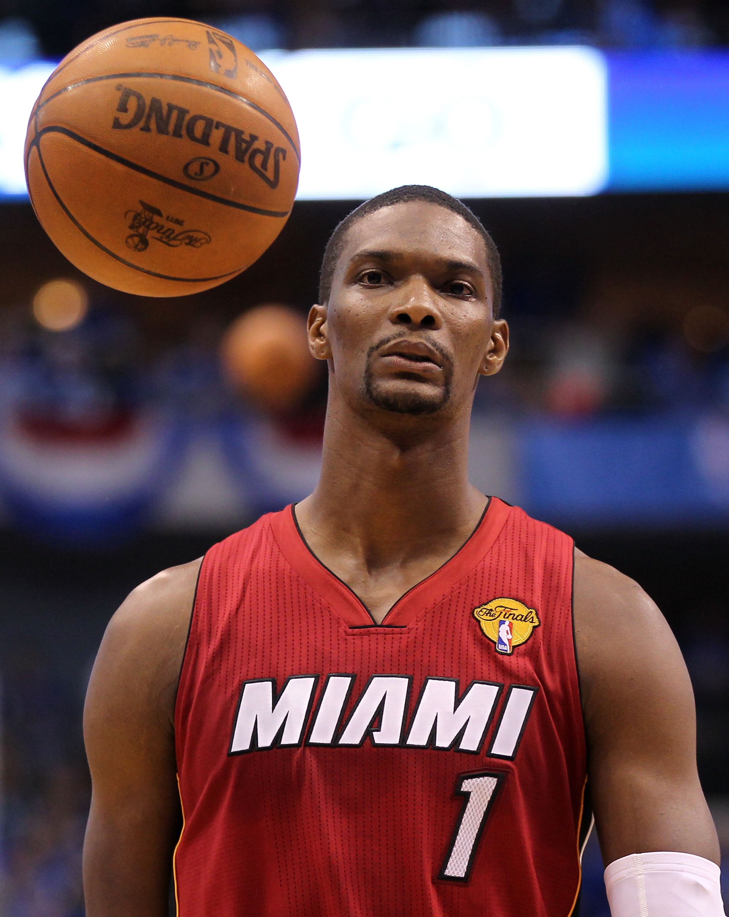 DALLAS, TX - JUNE 05:  Chris Bosh #1 of the Miami Heat looks on while taking on the Dallas Mavericks in Game Three of the 2011 NBA Finals at American Airlines Center on June 5, 2011 in Dallas, Texas.  NOTE TO USER: User expressly acknowledges and agrees t