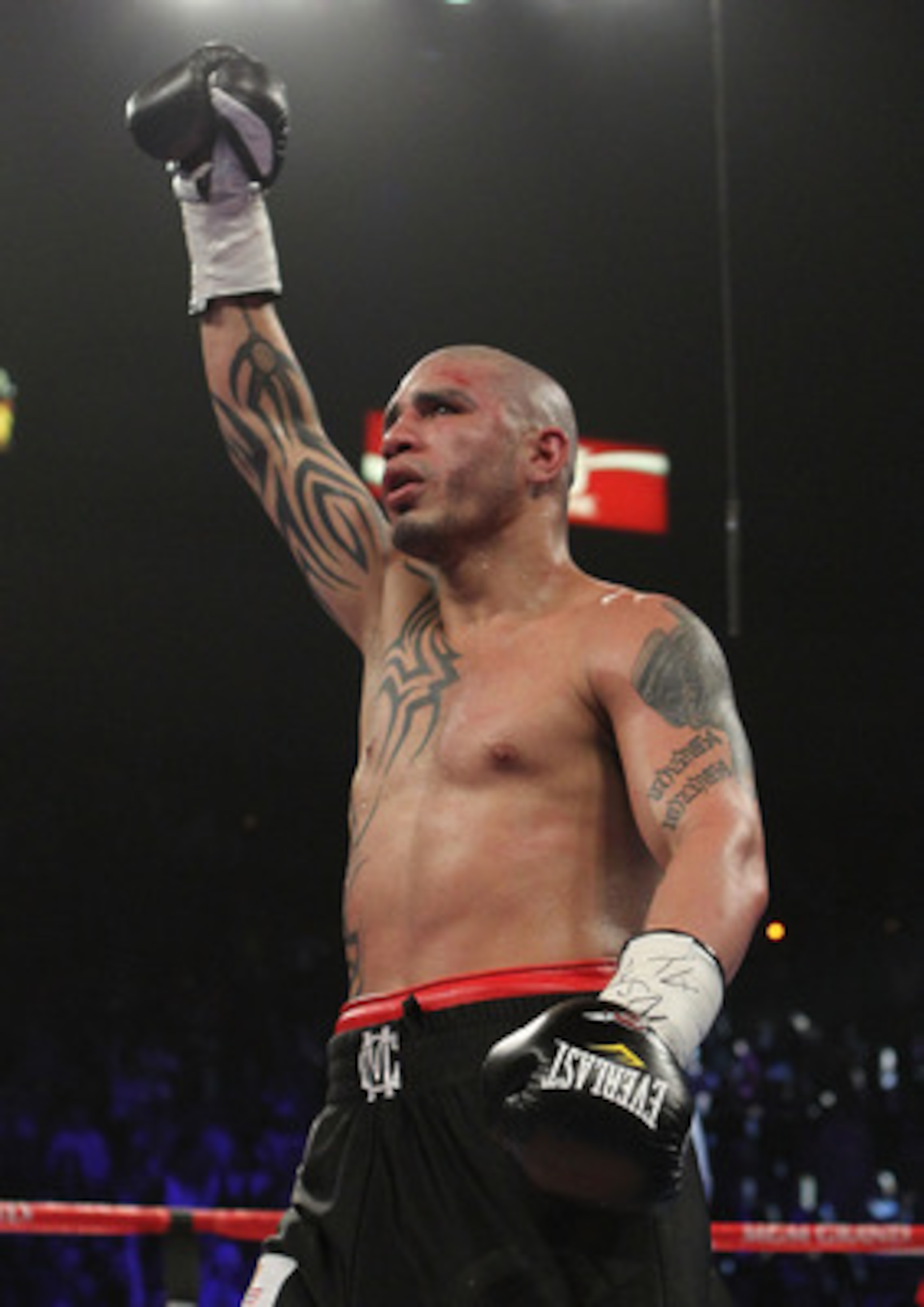 LAS VEGAS - MARCH 12:  Miguel Cotto celebrates his tko knockout win in the twelfth round against Ricardo Mayorga during their WBA Super Welterweight title bout at the MGM Grand Garden Arena on March 12, 2011 in Las Vegas, Nevada.  (Photo by Al Bello/Getty