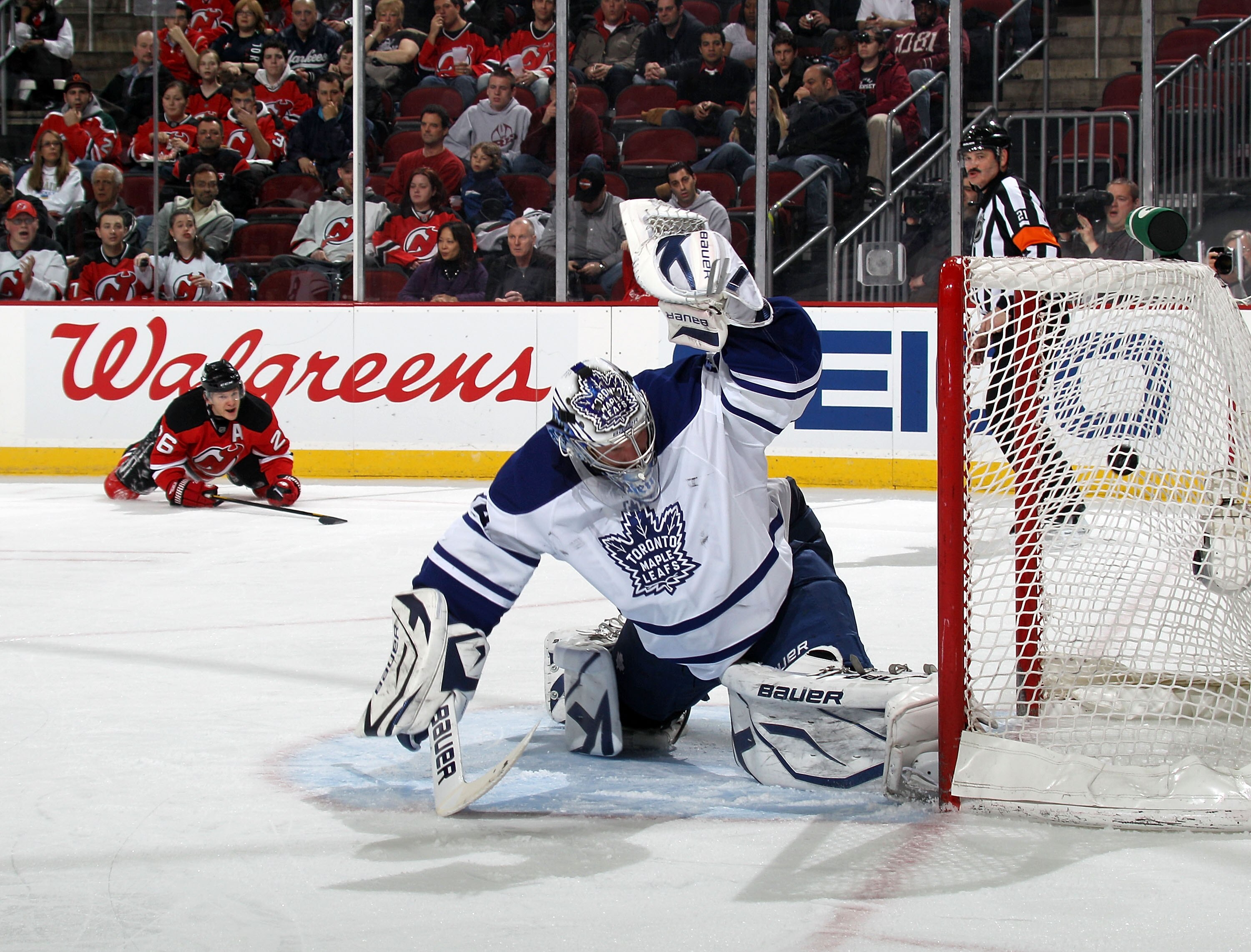 NEWARK, NJ - APRIL 06: A shot by Mattias Tedenby #21 of the New Jersey Devils (not shown) eludes James Reimer #34 of the Toronto Maple Leafs at 14:29 of the second period at the Prudential Center on April 6, 2011 in Newark, New Jersey.  (Photo by Bruce Be
