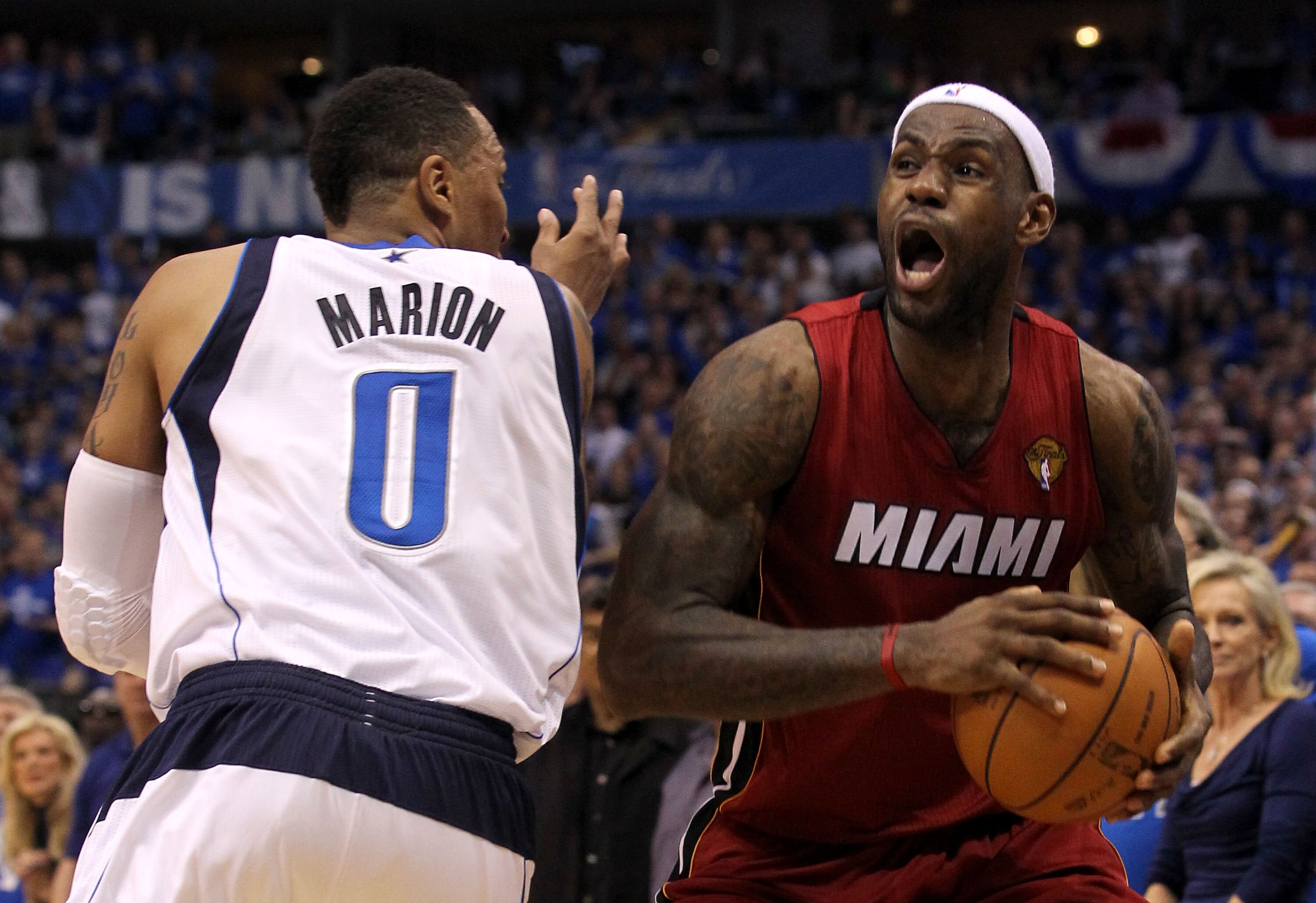 DALLAS, TX - JUNE 05:  LeBron James #6 of the Miami Heat reacts with the ball alongside Shawn Marion #0 of the Dallas Mavericks in the second half in Game Three of the 2011 NBA Finals at American Airlines Center on June 5, 2011 in Dallas, Texas.  NOTE TO