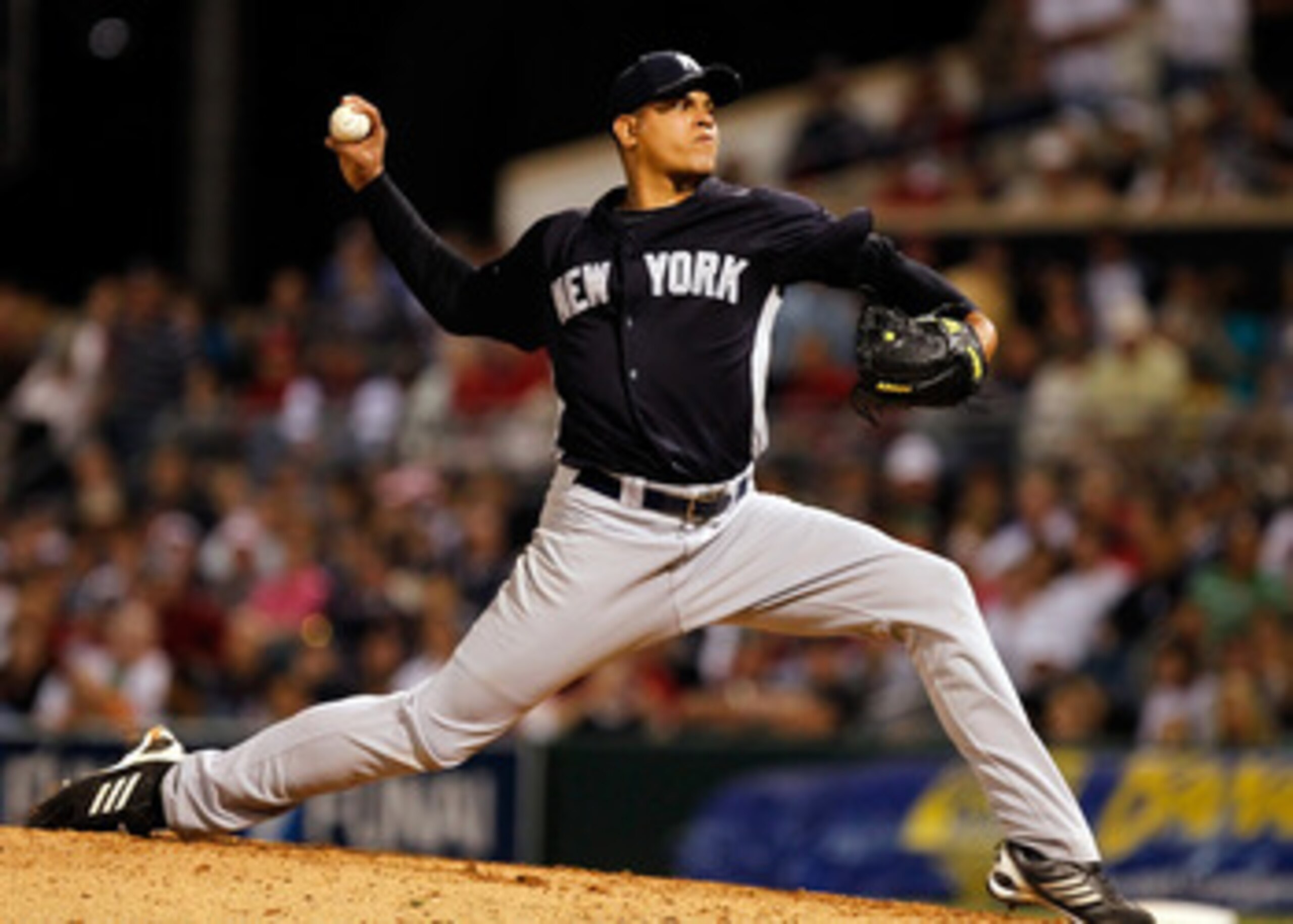 FORT MYERS, FL - MARCH 14:  Pitcher Dellin Betances #72 of the New York Yankees pitches against the Boston Red Sox during a Grapefruit League Spring Training Game at City of Palms Park on March 14, 2011 in Fort Myers, Florida.  (Photo by J. Meric/Getty Im