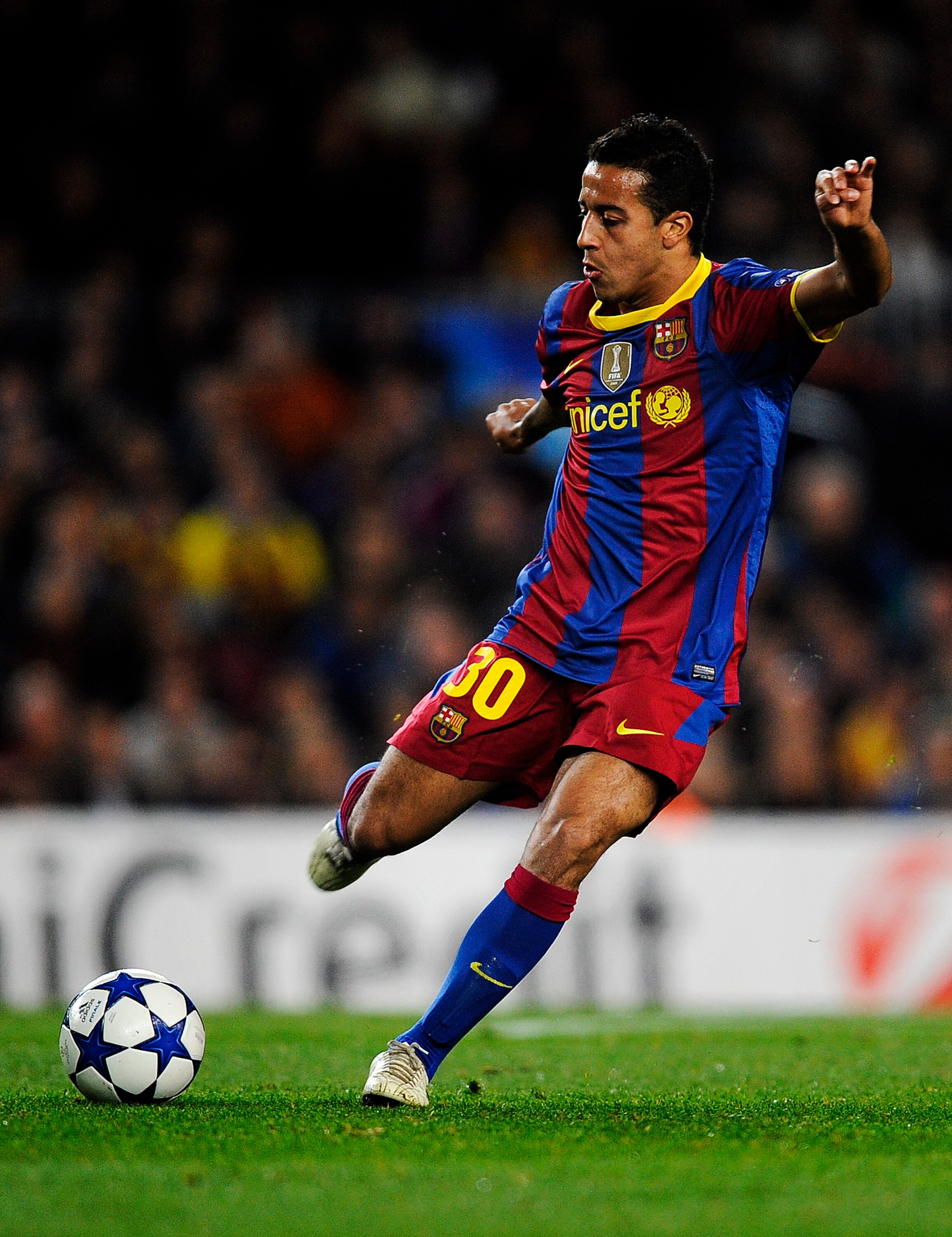 BARCELONA, SPAIN - DECEMBER 07:  Thiago Alcantara of Barcelona makes a pass during the Champions League match between Barcelona and Rubin Kazan at Camp Nou Stadium on December 7, 2010 in Barcelona, Spain. Barcelona won 2-0.  (Photo by David Ramos/Getty Im