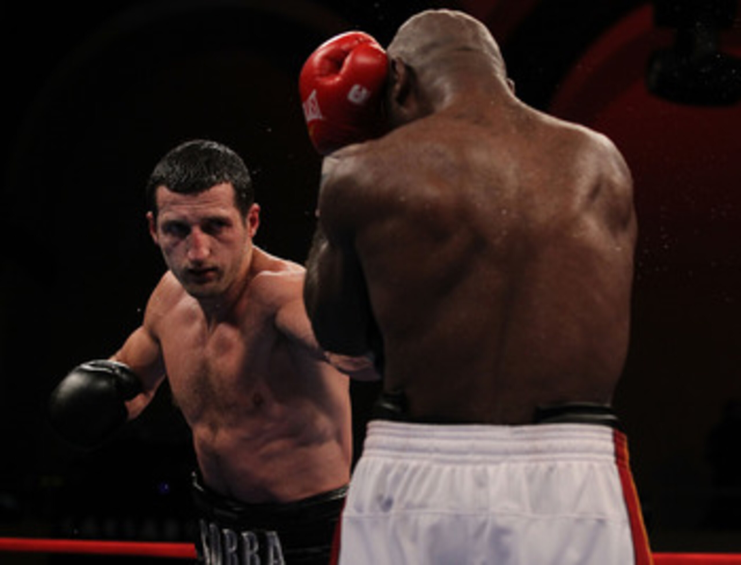 ATLANTIC CITY, NJ - JUNE 04:  Carl Froch punches Glen Johnson during their WBC Super Middleweight title bout at Boardwalk Hall on June 4, 2011 in Atlantic City, New Jersey.  (Photo by Al Bello/Getty Images)