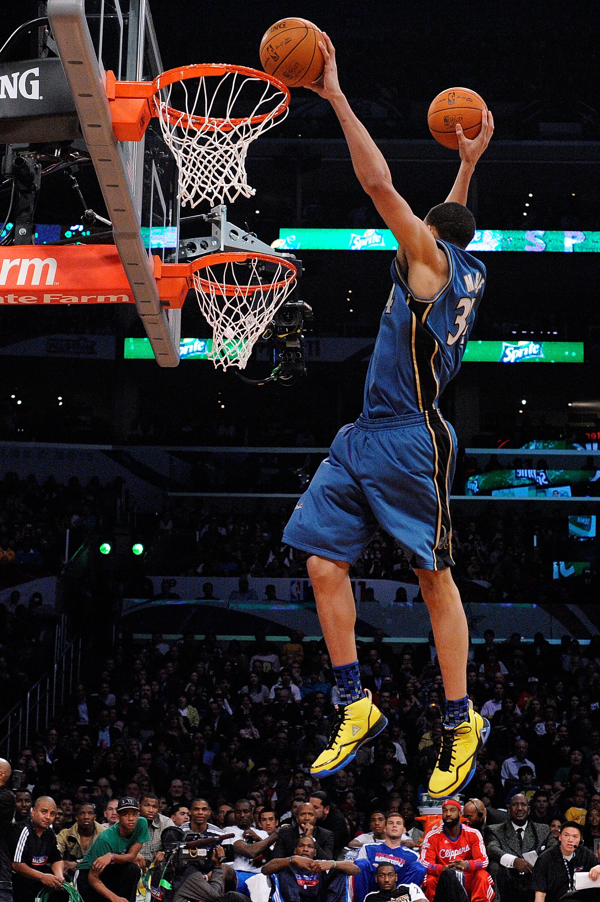 LOS ANGELES, CA - FEBRUARY 19:  JaVale McGee #34 of the Washington Wizards dunks two balls on the same jump in the first round of the Sprite Slam Dunk Contest apart of NBA All-Star Saturday Night at Staples Center on February 19, 2011 in Los Angeles, Cali