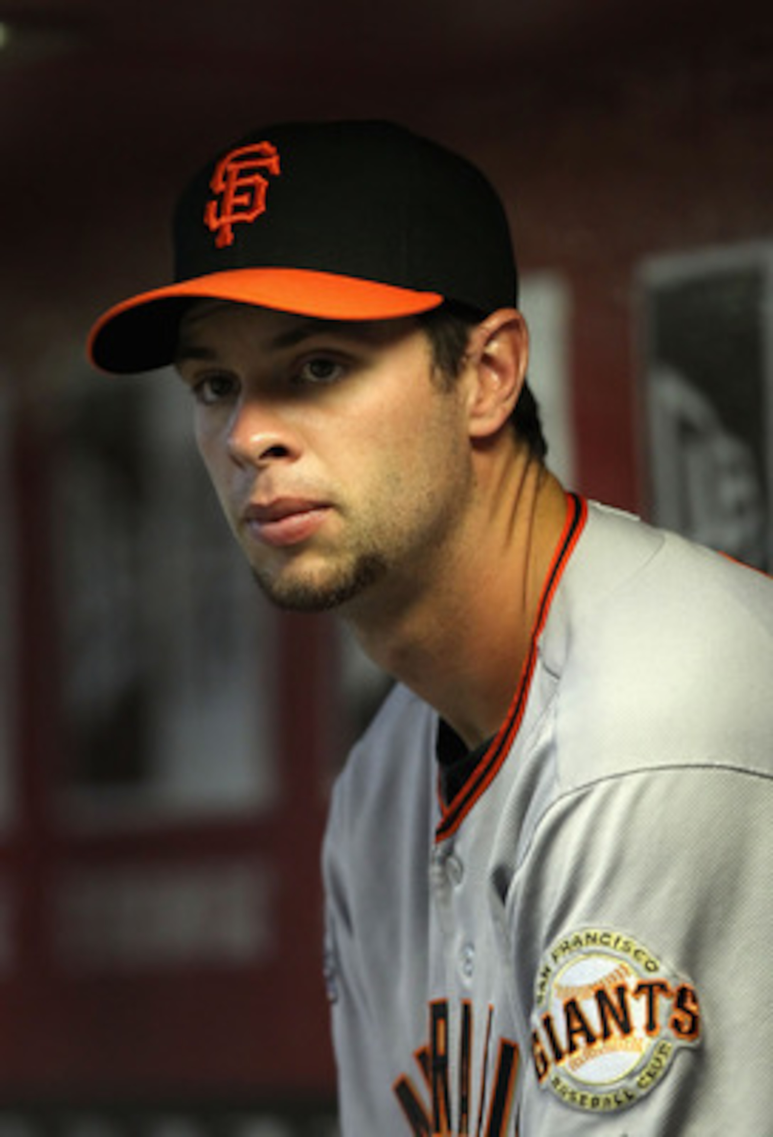 PHOENIX, AZ - APRIL 17:  Brandon Belt #9 of the San Francisco Giants watches from the dugout during the Major League Baseball game against the Arizona Diamondbacks at Chase Field on April 17, 2011 in Phoenix, Arizona.  (Photo by Christian Petersen/Getty I