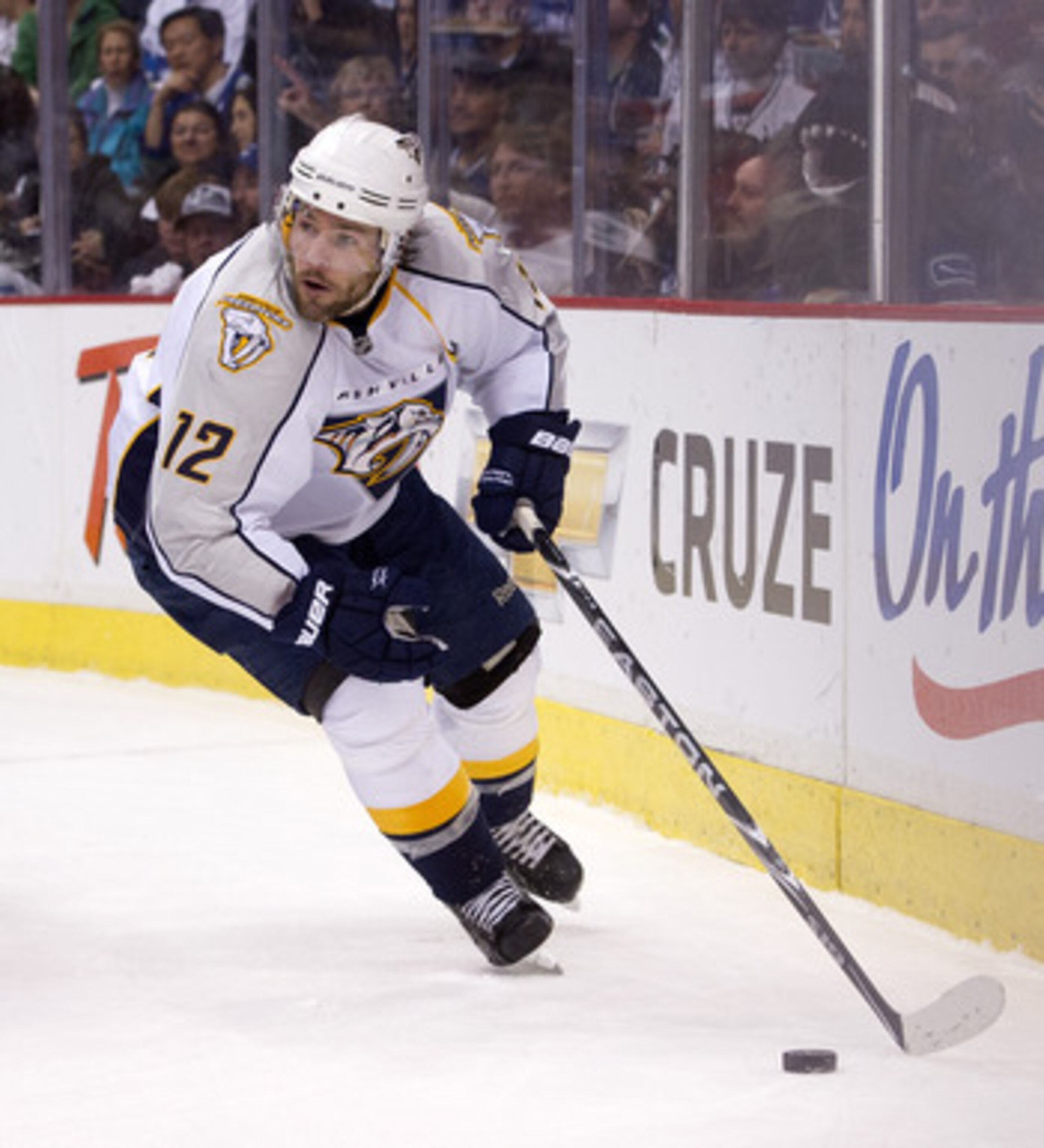 VANCOUVER, CANADA - APRIL 28: Mike Fisher #12 of the Nashville Predators skates with the puck during Game One of the Western Conference Semifinals against the Vancouver Canucks during the 2011 NHL Stanley Cup Playoffs on April 28, 2011 at Rogers Arena in 