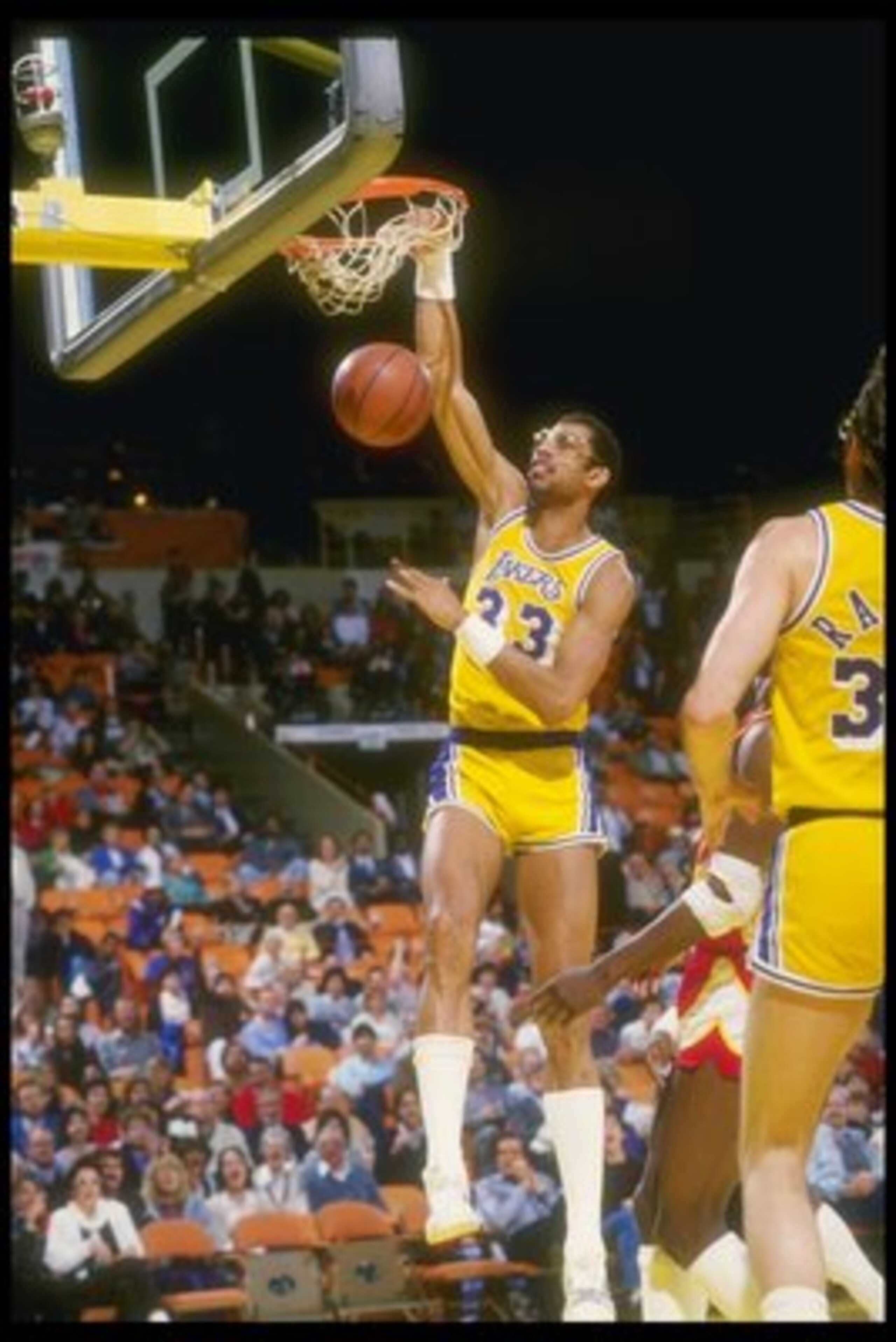 1986-1987: Center Kareem Abdul-Jabbar of the Los Angeles Lakers slams an easy two-pointer over the Atlanta Hawks during a game at The Forum in Inglewood, California. Mandatory Credit: Stephen Dunn /Allsport 1986-1987: Center Kareem Abdul-Jabbar of the Los Angeles Lakers slams an easy two-pointer over the Atlanta Hawks during a game at The Forum in Inglewood, California. Mandatory Credit: Stephen Dunn /Allsport