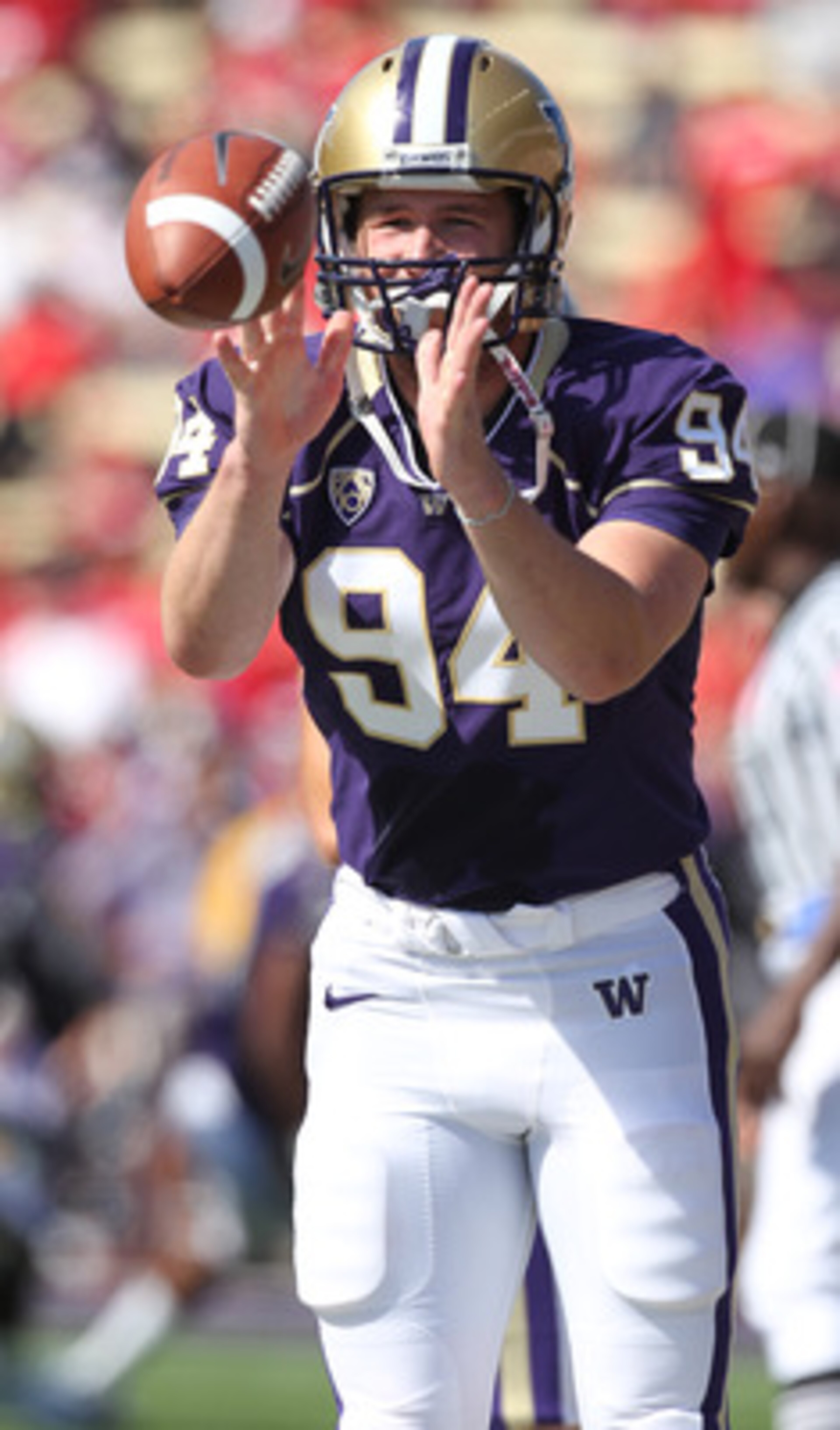 SEATTLE - SEPTEMBER 18: Punter Kiel Rasp #94 of the Washington Huskies warms up prior to the game against the Nebraska Cornhuskers on September 18, 2010 at Husky Stadium in Seattle, Washington. (Photo by Otto Greule Jr/Getty Images)