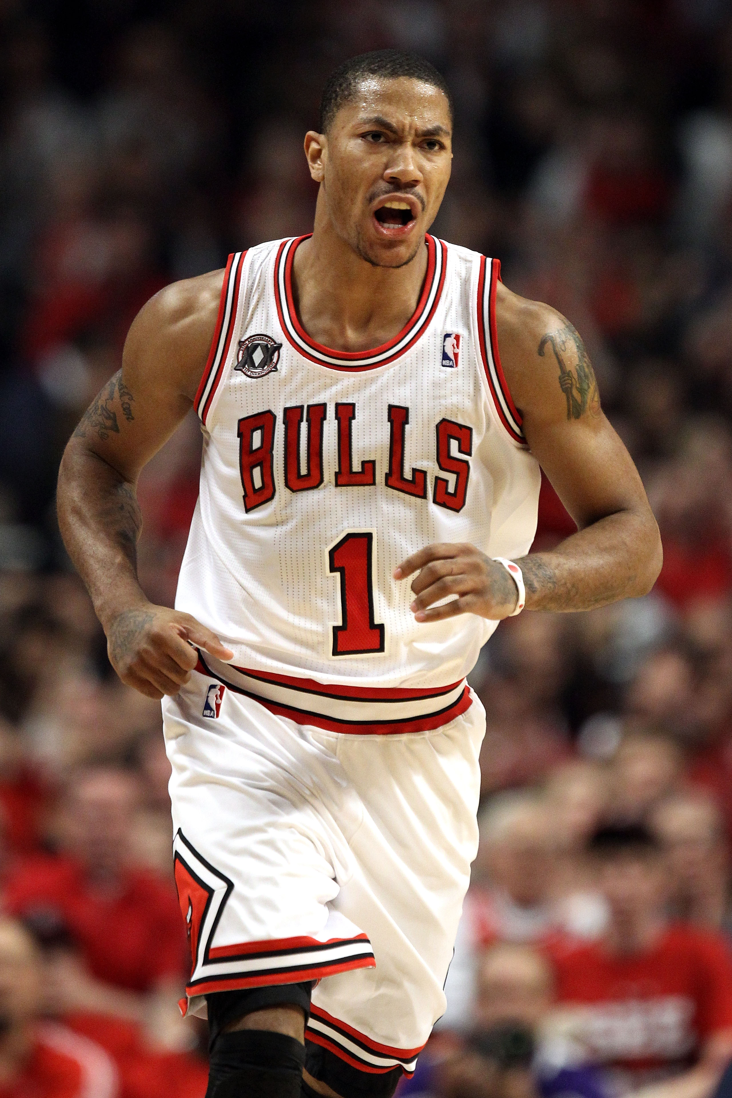 CHICAGO, IL - MAY 26:  Derrick Rose #1 of the Chicago Bulls reacts against the Miami Heat in Game Five of the Eastern Conference Finals during the 2011 NBA Playoffs on May 26, 2011 at the United Center in Chicago, Illinois. NOTE TO USER: User expressly ac