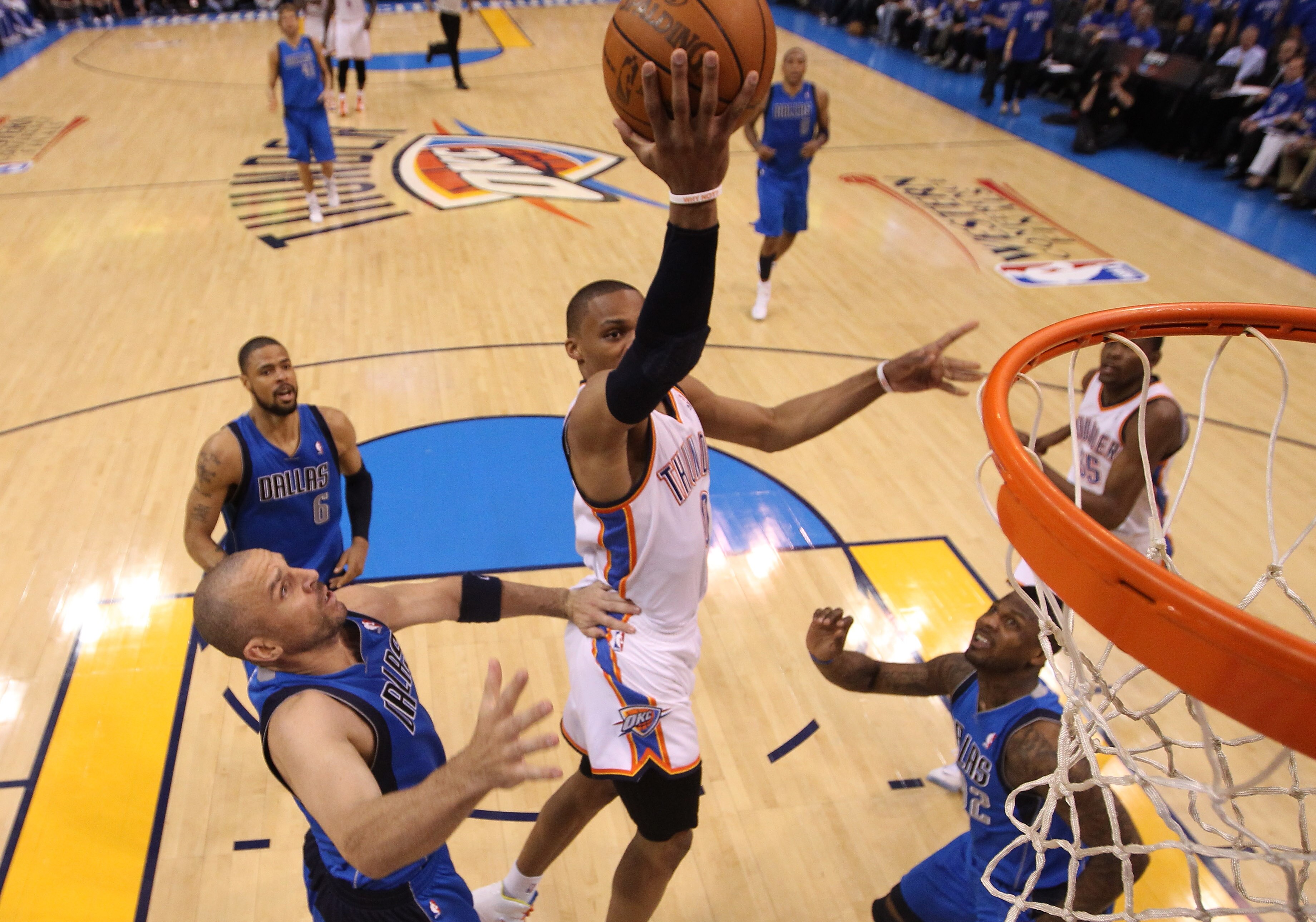 OKLAHOMA CITY, OK - MAY 23:  Russell Westbrook #0 of the Oklahoma City Thunder goes up for a shot between Jason Kidd #2 and DeShawn Stevenson #92 of the Dallas Mavericks in Game Four of the Western Conference Finals during the 2011 NBA Playoffs at Oklahom