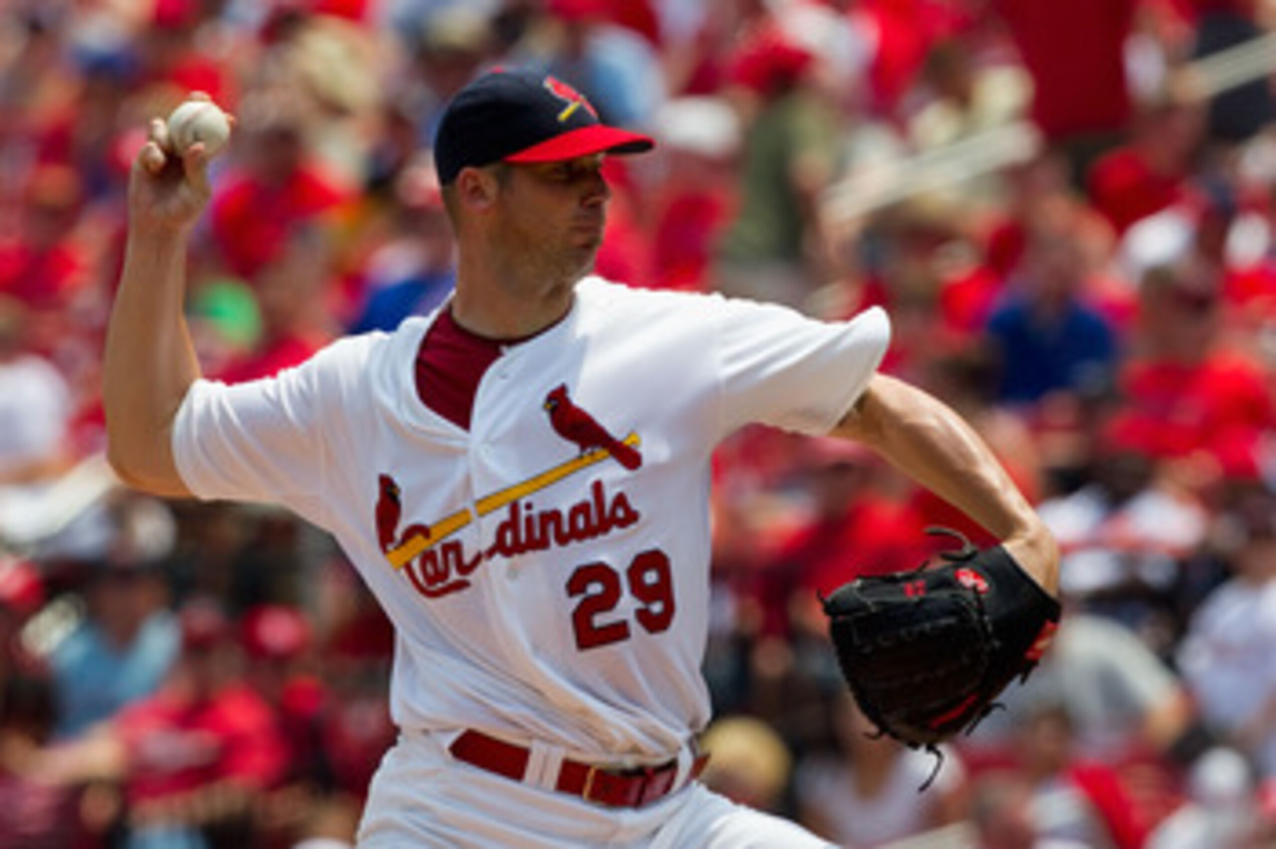ST. LOUIS, MO - JUNE 5: Starter Chris Carpenter #29 of the St. Louis Cardinals pitches against the Chicago Cubs at Busch Stadium on June 5, 2011 in St. Louis, Missouri.  The Cardinals beat the Cubs 3-2 in 10 innings.  (Photo by Dilip Vishwanat/Getty Image