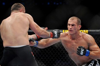 DALLAS - SEPTEMBER 19:  UFC fighter Junior Dos Santos (R) battles UFC fighter Mirko Cro Cop (L) during their Heavyweight bout at UFC 103: Franklin vs. Belfort at the American Airlines Center on September 19, 2009 in Dallas, Texas.  (Photo by Jon Kopaloff/