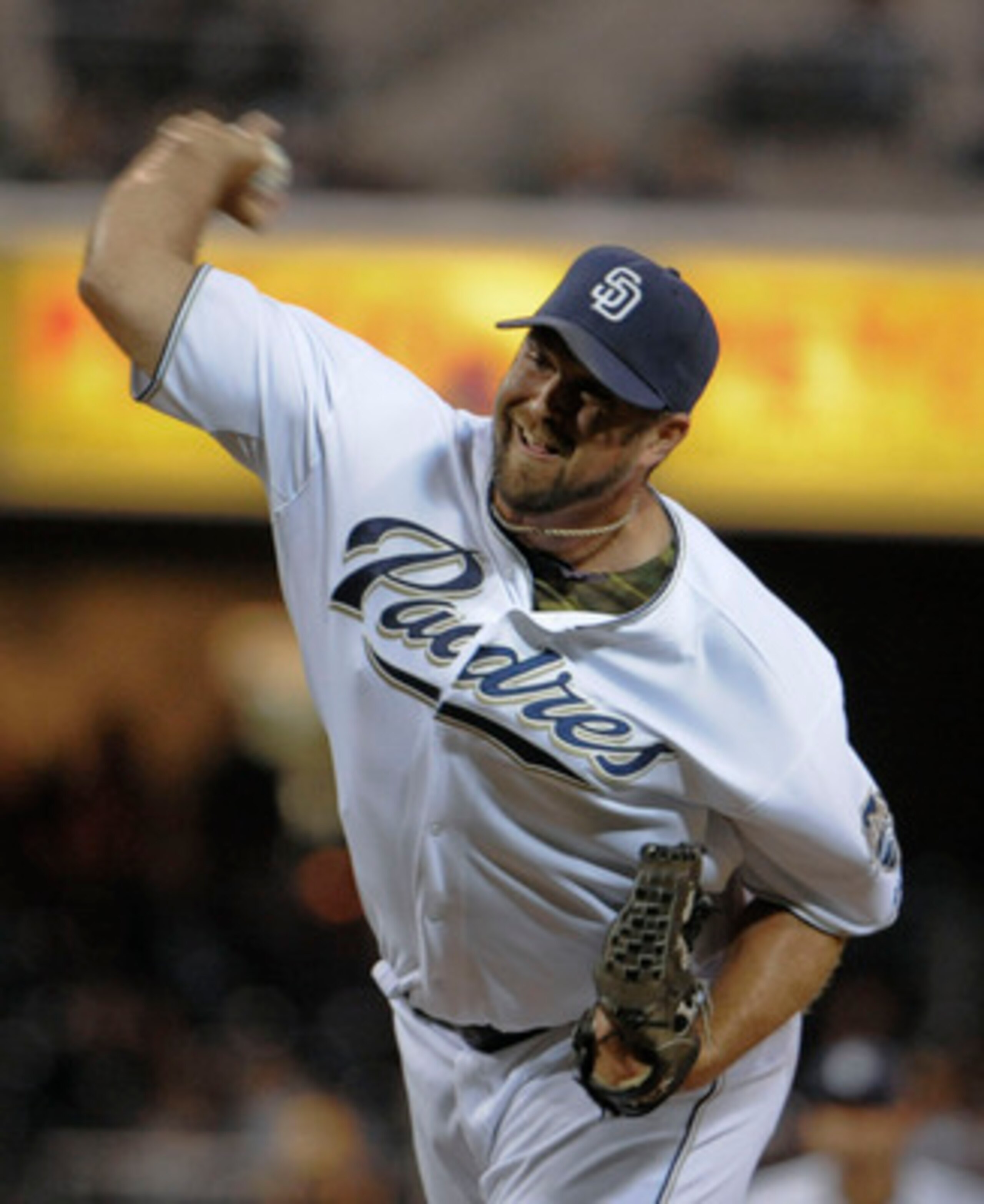 SAN DIEGO, CA-JUNE 3: Heath Bell #21 of the San Diego Padres pitches during the ninth inning of a baseball game against the Houston Astros at Petco Park on June 3, 2011 in San Diego, California.  (Photo by Denis Poroy/Getty Images)
