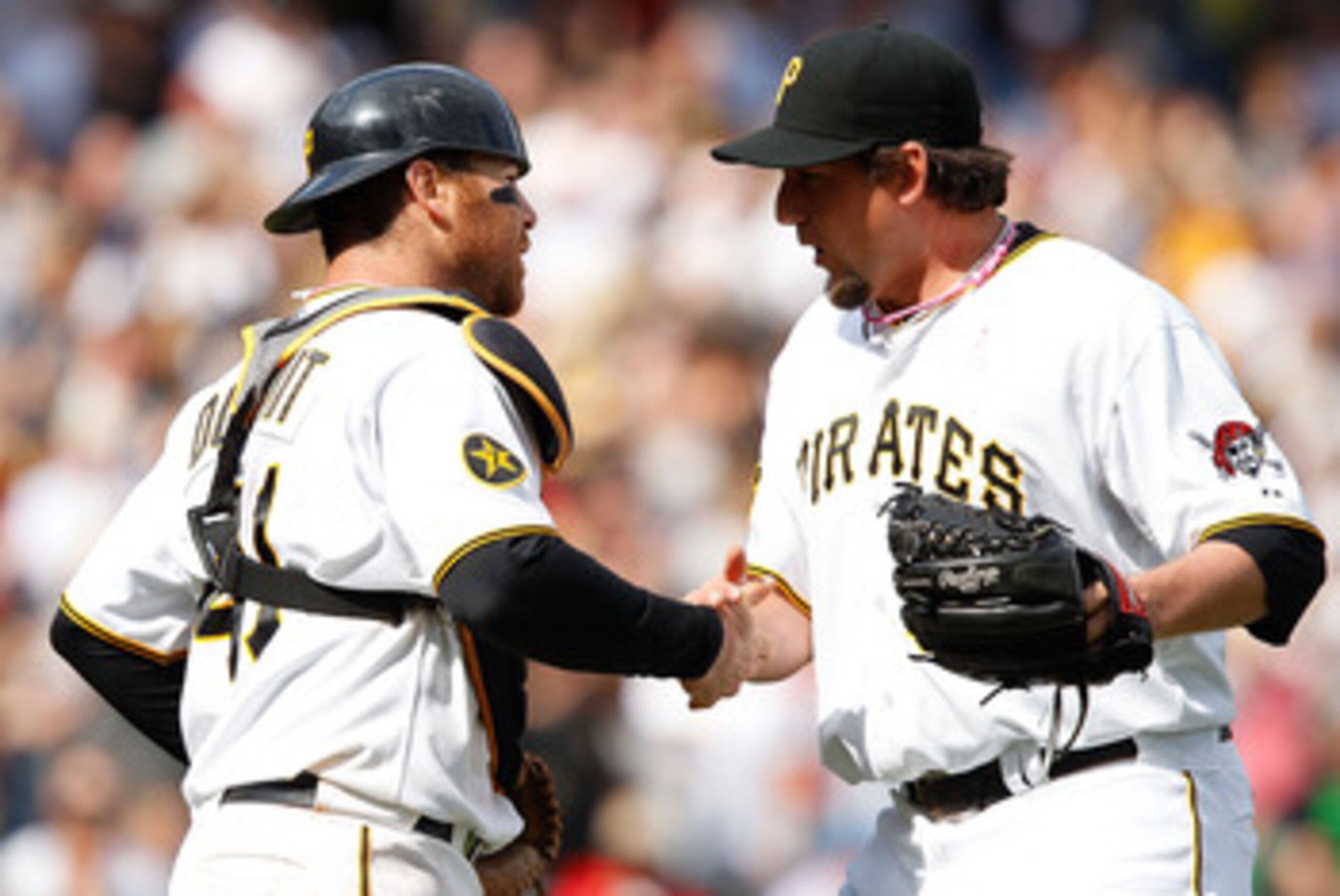 PITTSBURGH - MAY 08:  Joel Hanrahan #52 of the Pittsburgh Pirates celebrates with teammate Ryan Doumit #41 after their win against the Houston Astros during the game on May 8, 2011 at PNC Park in Pittsburgh, Pennsylvania.  (Photo by Jared Wickerham/Getty 