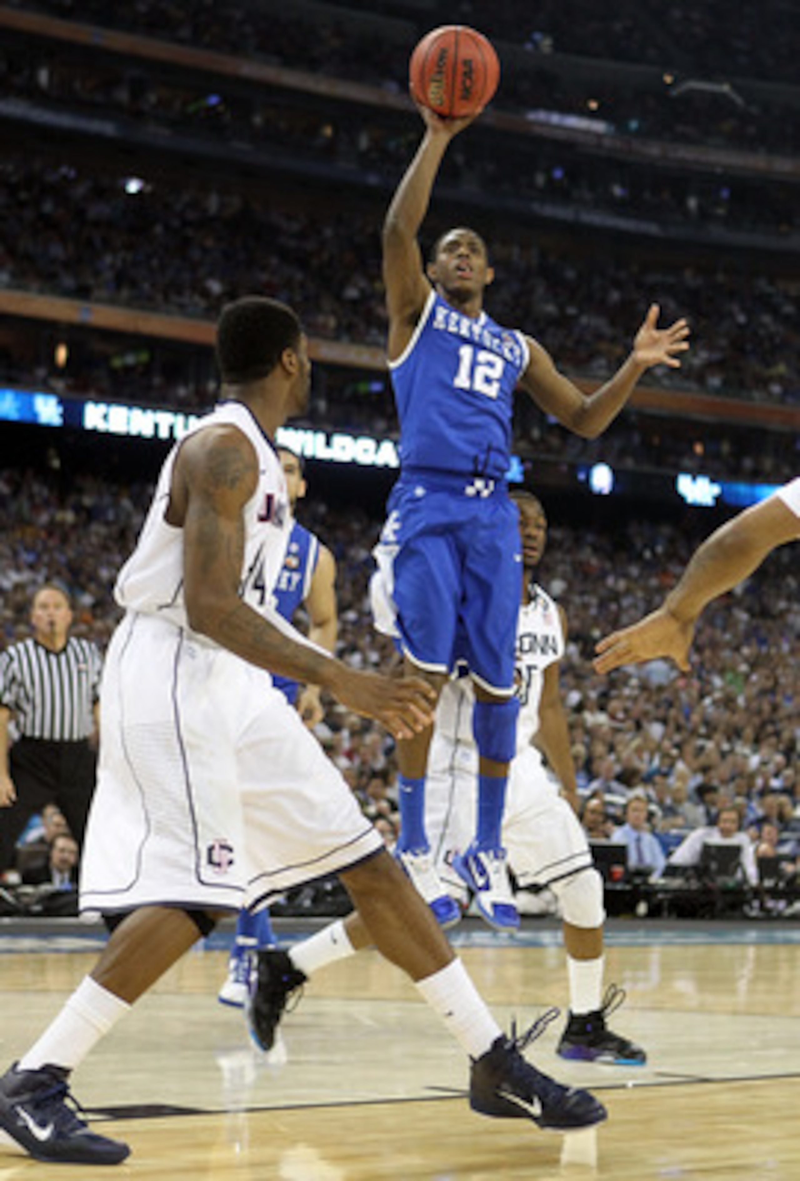 HOUSTON, TX - APRIL 02:  Brandon Knight #12 of the Kentucky Wildcats shoots against the Connecticut Huskies during the National Semifinal game of the 2011 NCAA Division I Men's Basketball Championship at Reliant Stadium on April 2, 2011 in Houston, Texas.