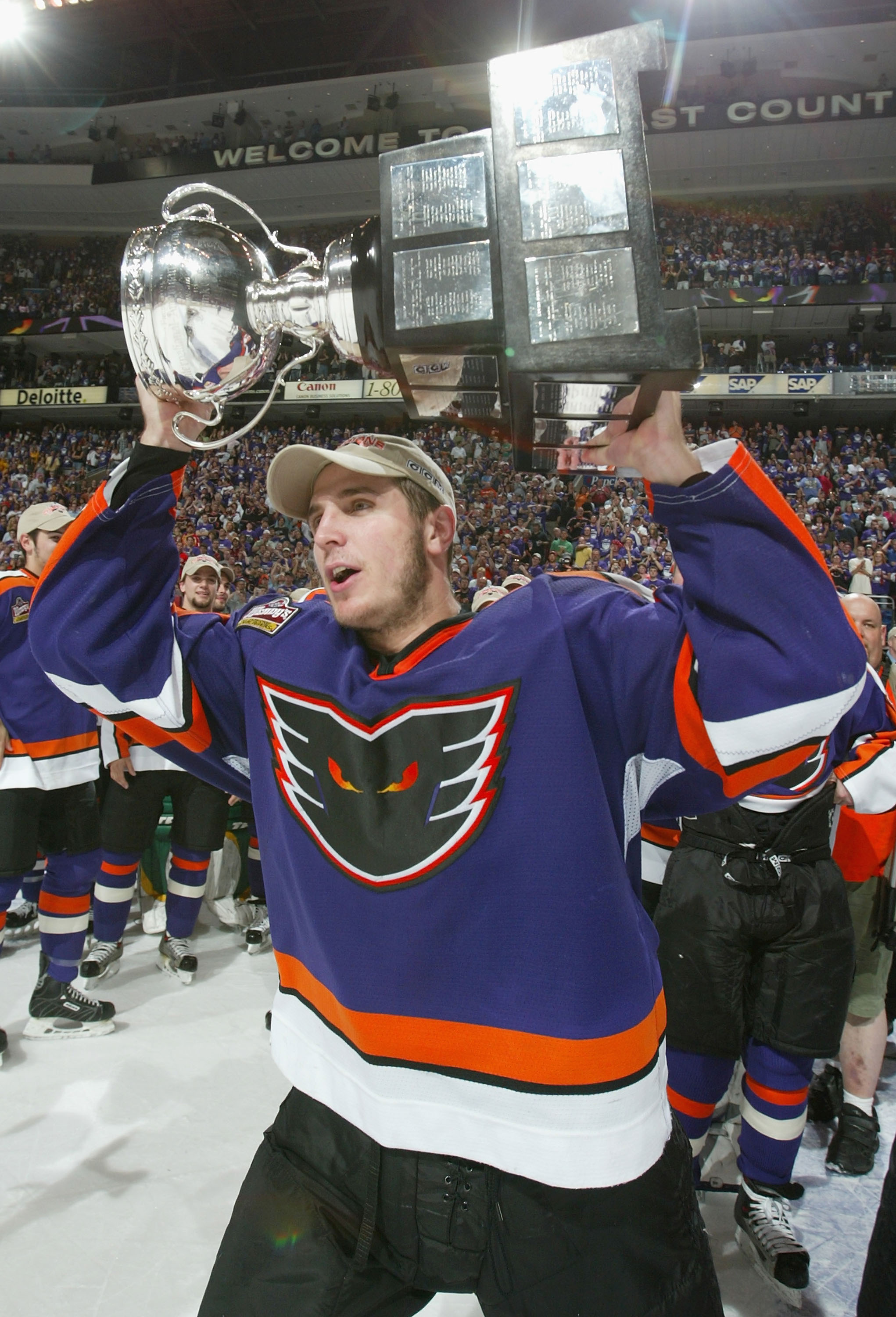 PHILADELPHIA - JUNE 10:  Mike Richards #18 of the Philadelphia Phantoms celebrates on the ice with the Calder Cup after defeating the Chicago Wolves in the American Hockey League Calder Cup final game at the Wachovia Center on June 10, 2005 in Philadelphi