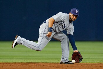 ATLANTA, GA - JUNE 01:  Jason Bartlett #8 of the San Diego Padres scoops up a ground ball hit by Jordan Schafer #1 of the Atlanta Braves in the fourth inning at Turner Field on June 1, 2011 in Atlanta, Georgia.  (Photo by Kevin C. Cox/Getty Images)