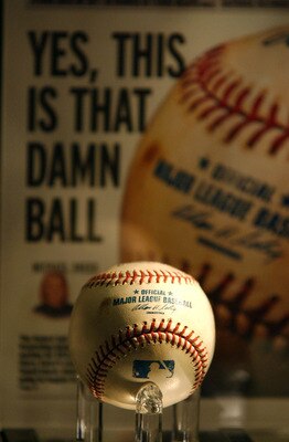 CHICAGO - FEBURARY 26: The infamous cursed Chicago Cubs foul baseball from the 2003 National League Championship Series against the Florida Marlins on display in it's last intact resting place at Harry Caray's Restaurant before being destroyed on February