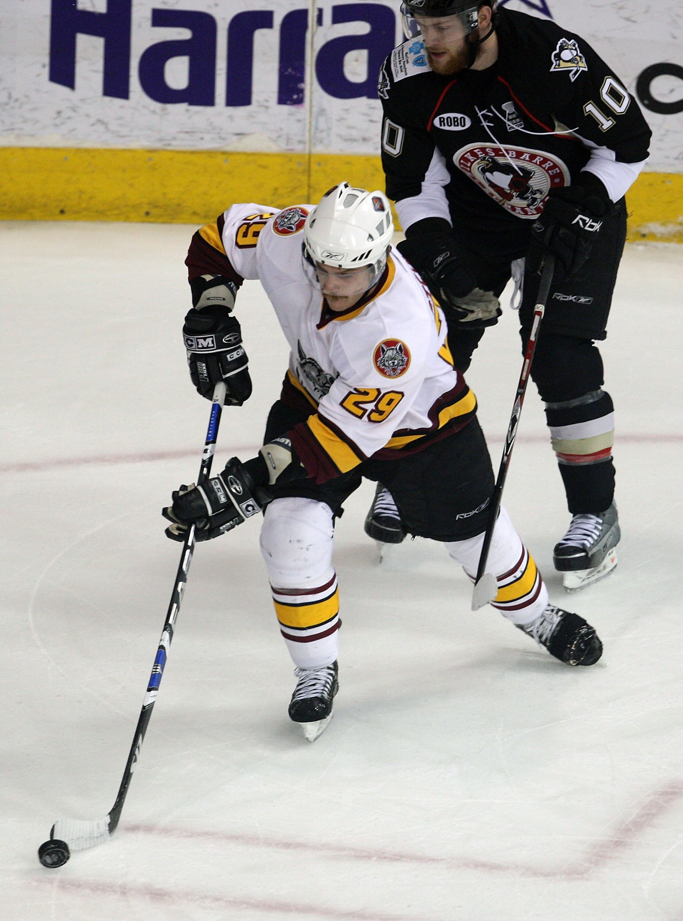 ROSEMONT, IL - JUNE 10:  Brett Sterling #29 of the Chicago Wolves controls the puck in front of Mark Letestu #10 of the Wilkes-Barre/Scranton Penguins during the Calder Cup Finals on June 10, 2008 at the Allstate Arena in Rosemont, Illinois. (Photo by Jon