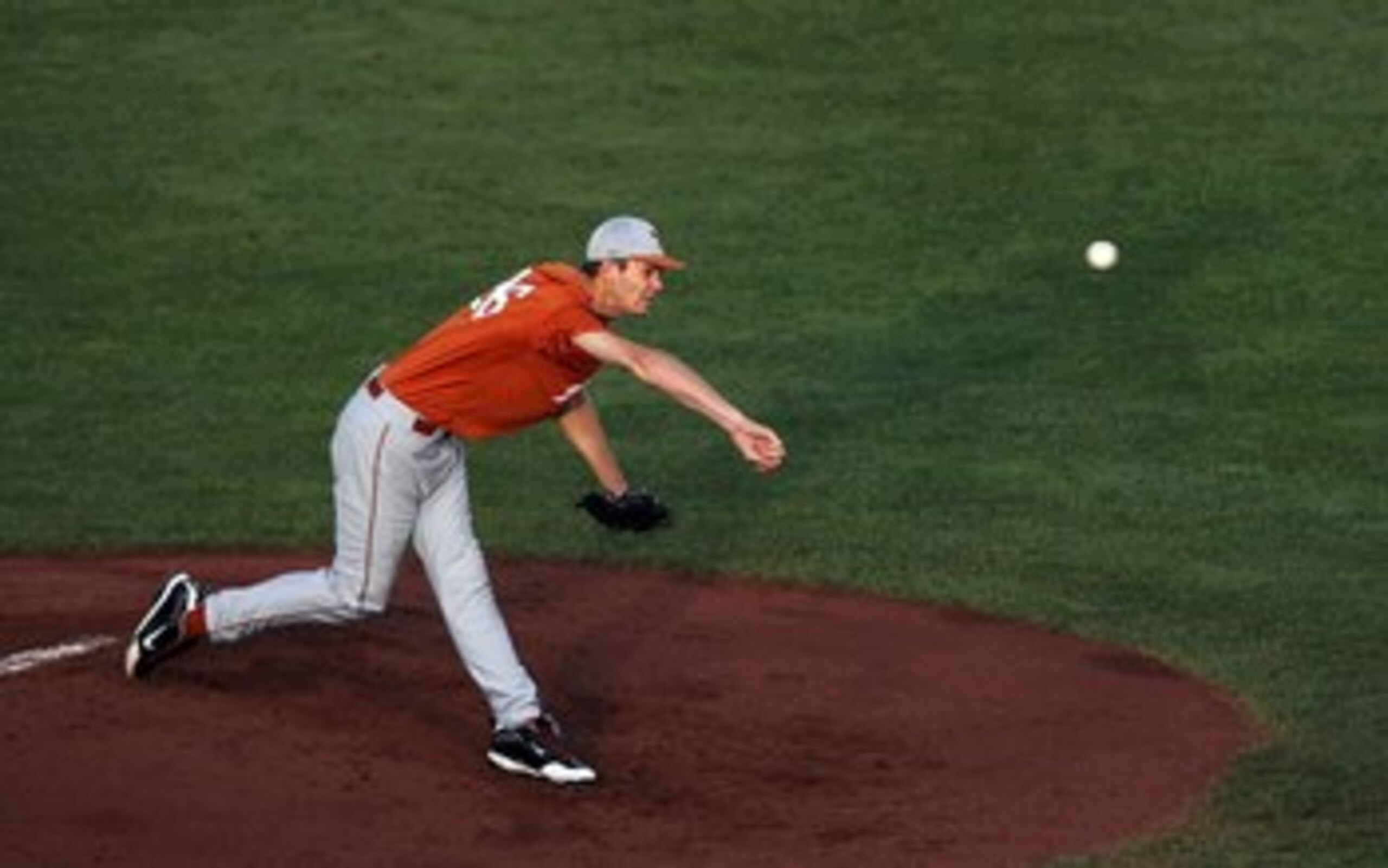 OMAHA, NE - JUNE 23:  Taylor Jungmann #26 of the Texas Longhorns delivers a pitch against the Louisiana State University Tigers during Game 2 of the 2009 NCAA College World Series at Rosenblatt Stadium on June 23, 2009 in Omaha, Nebraska. The Longhorns de