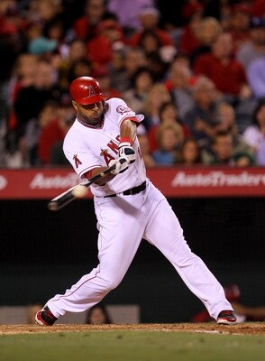 ANAHEIM, CA - MAY 7:   Vernon Wells #10 of the Los Angeles Angels of Anaheim picks up an RBI in the sixth inning with a sacrifice fly against the Cleveland Indians on May 7, 2011 at Angel Stadium in Anaheim, California.    (Photo by Stephen Dunn/Getty Ima