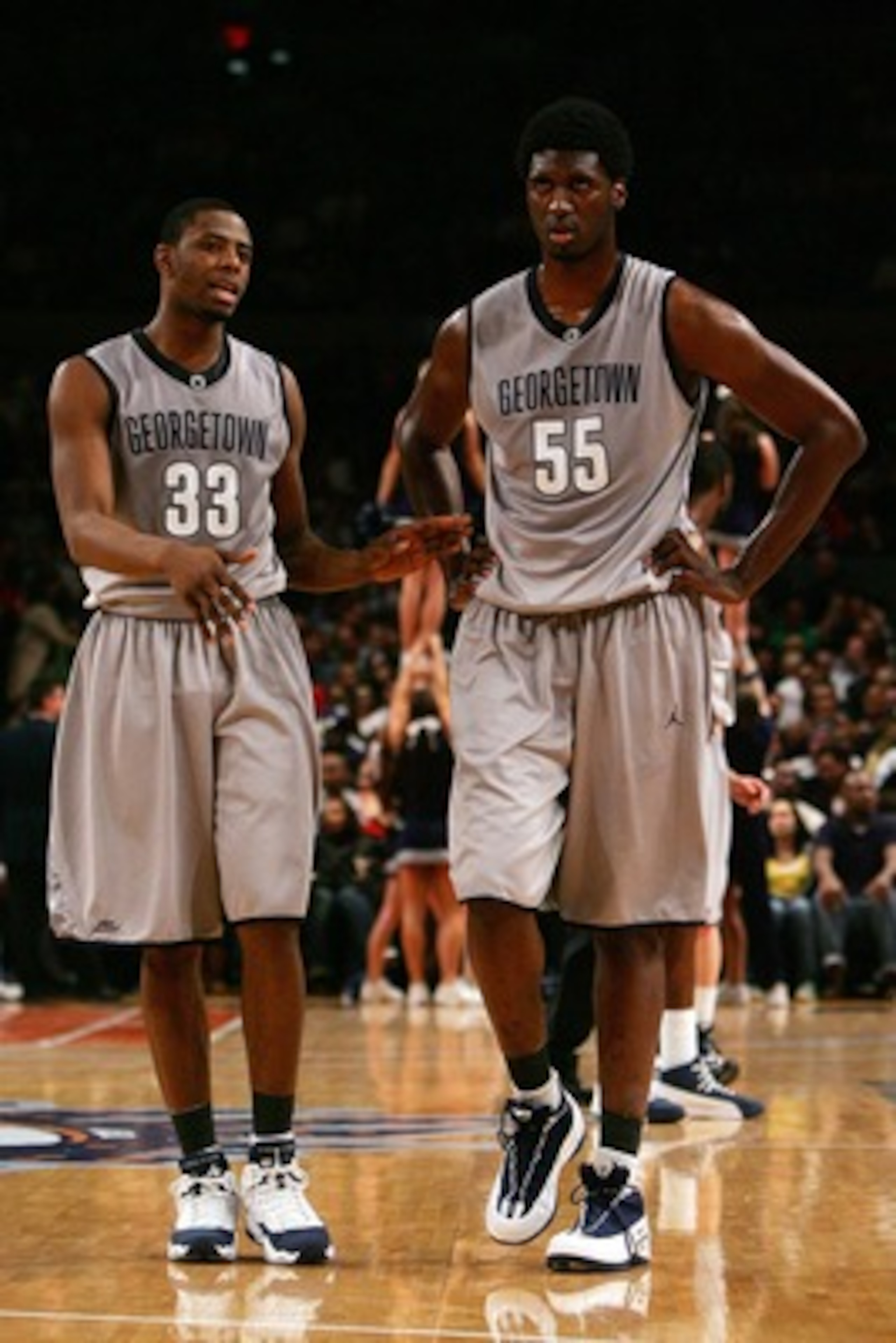 NEW YORK - MARCH 15: Patrick Ewing Jr. #33 and Roy Hibbert #55 of the Georgetown Hoyas react to a play against the Pittsburgh Panthers during the final of the 2008 Big East Men's Basketball Championship at Madison Square Garden on March 15, 2008 in New Yo