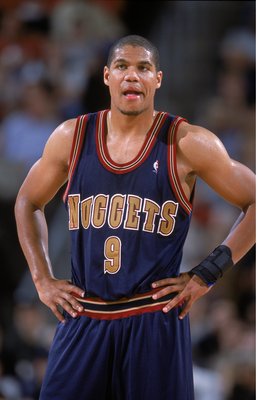 1 Nov 2000: Tariq Abdul-Wahad #9 of the Denver Nuggets waits on the court during the game against the Seattle SuperSonics at the Key Arena in Seattle, Washington. The Sonics defeated the Nuggets 112-99. NOTE TO USER: It is expressly understood that the on