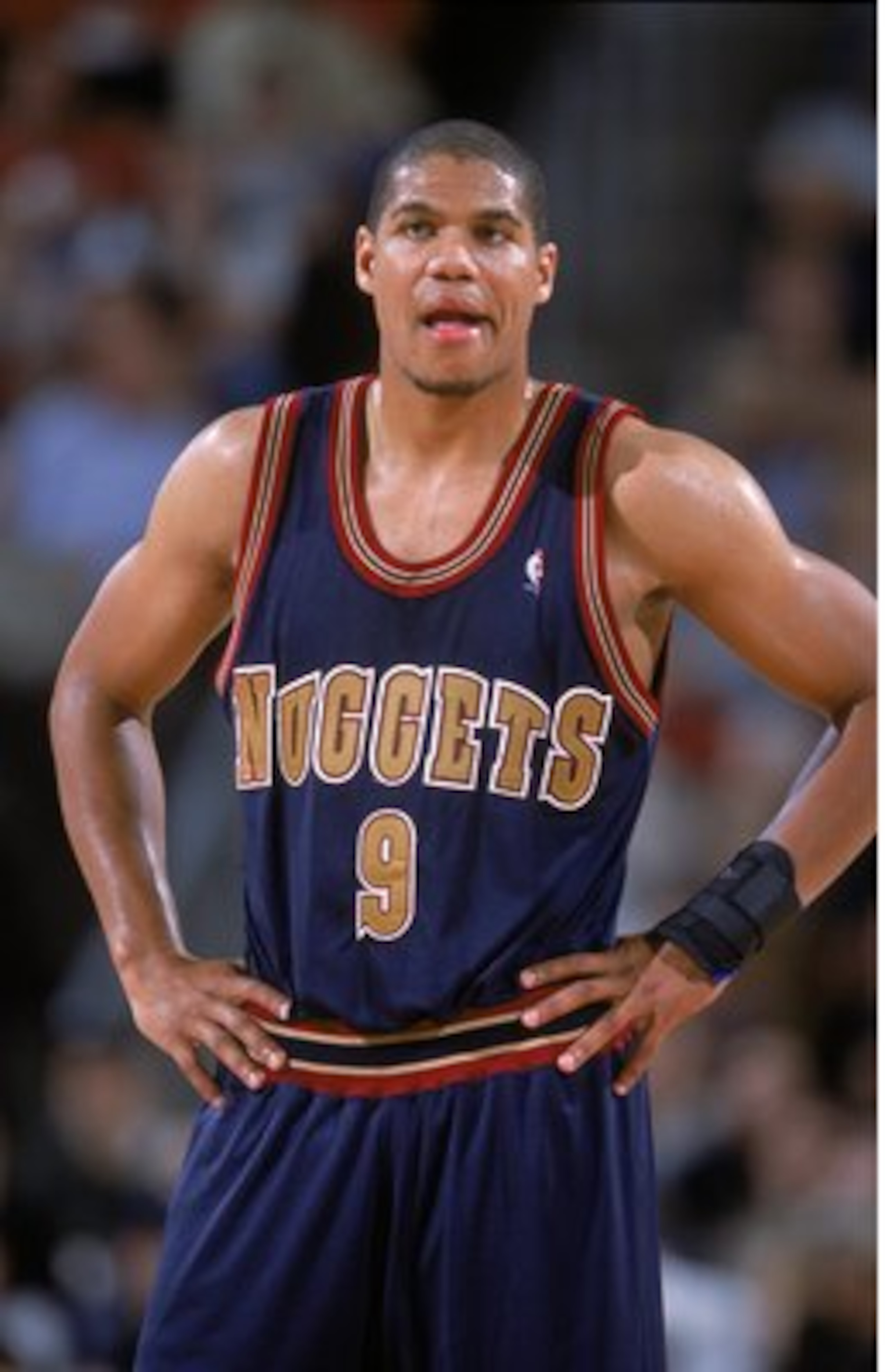 1 Nov 2000: Tariq Abdul-Wahad #9 of the Denver Nuggets waits on the court during the game against the Seattle SuperSonics at the Key Arena in Seattle, Washington. The Sonics defeated the Nuggets 112-99. NOTE TO USER: It is expressly understood that the on