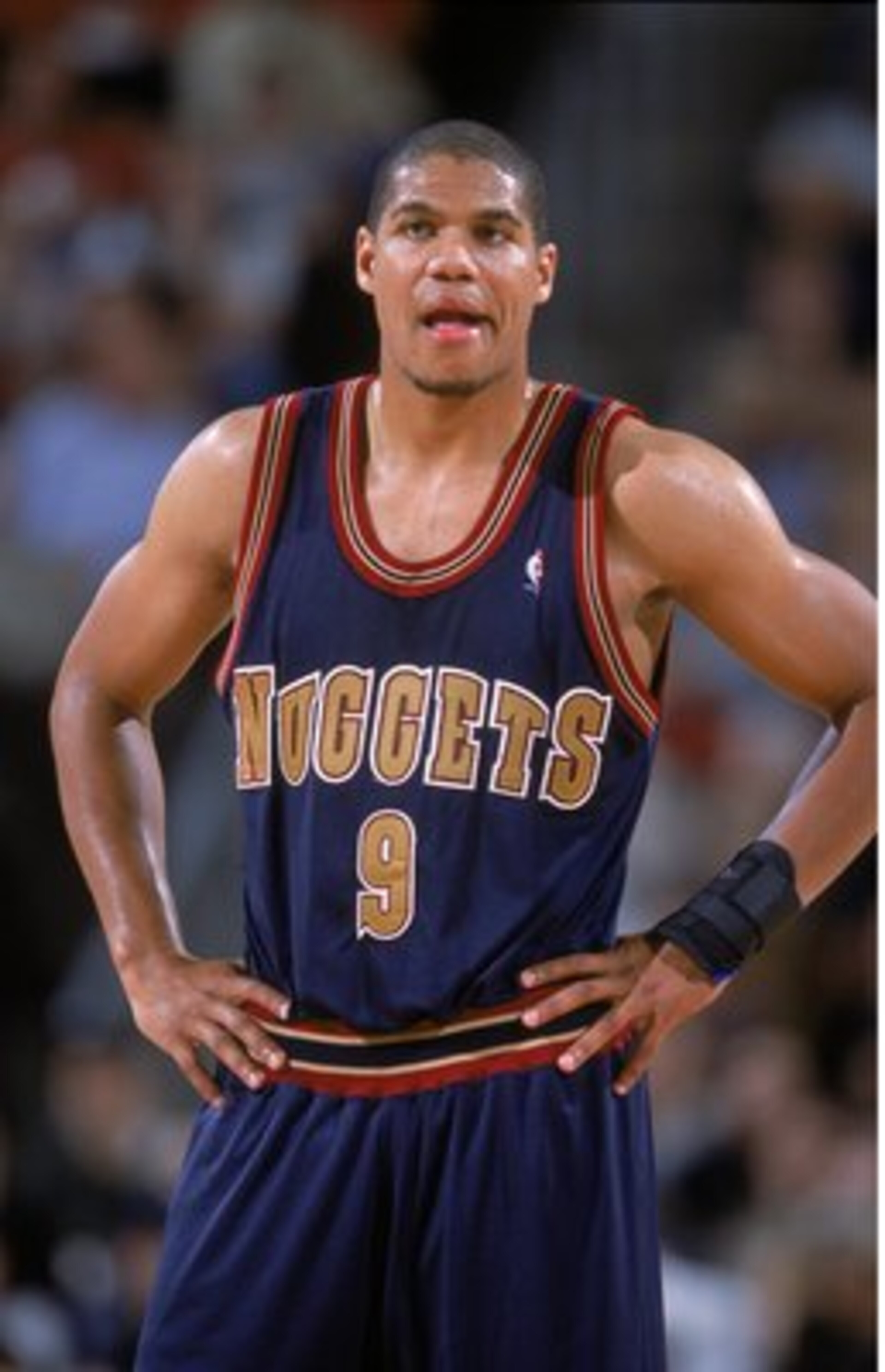 1 Nov 2000: Tariq Abdul-Wahad #9 of the Denver Nuggets waits on the court during the game against the Seattle SuperSonics at the Key Arena in Seattle, Washington. The Sonics defeated the Nuggets 112-99. NOTE TO USER: It is expressly understood that the on