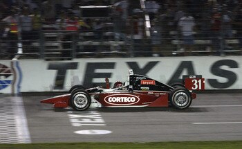 FT. WORTH, TX - JUNE 7:  Al Unser Jr. celebrates as he crosses the finish line to win  the IRL (Indy Racing League) IndyCar Series Bombardier 500 on June 7, 2003 at the Texas Motor Speedway in Ft. Worth, Texas. (Photo by Jonathan Ferrey/Getty Images).