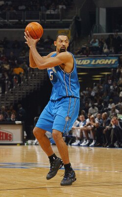 WASHINGTON - DECEMBER 10:  Juwan Howard #5 of the Orlando Magic holds the ball during the game against the Washington Wizards at MCI Center on December 10, 2003 in Washington, D.C.  The Magic won 95-91.  NOTE TO USER: User expressly acknowledges and agree