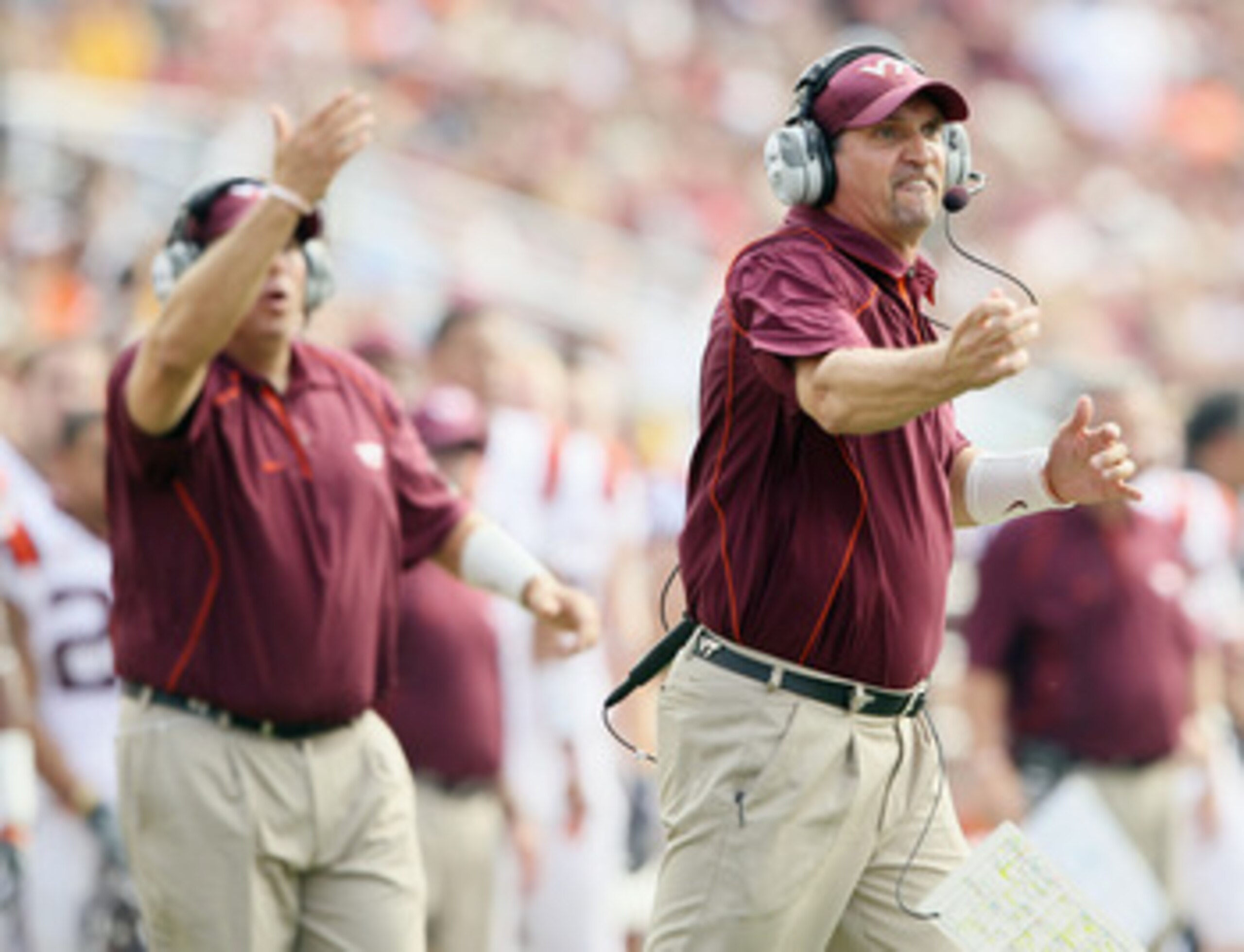 CHESTNUT HILL, MA - SEPTEMBER 25:  Defensive coordinator Bud Foster of the Virginia Tech Hokies directs his players in the final minutes of the first half against the Boston College Eagles on September 25, 2010 at Alumni Stadium in Chestnut Hill, Massachu
