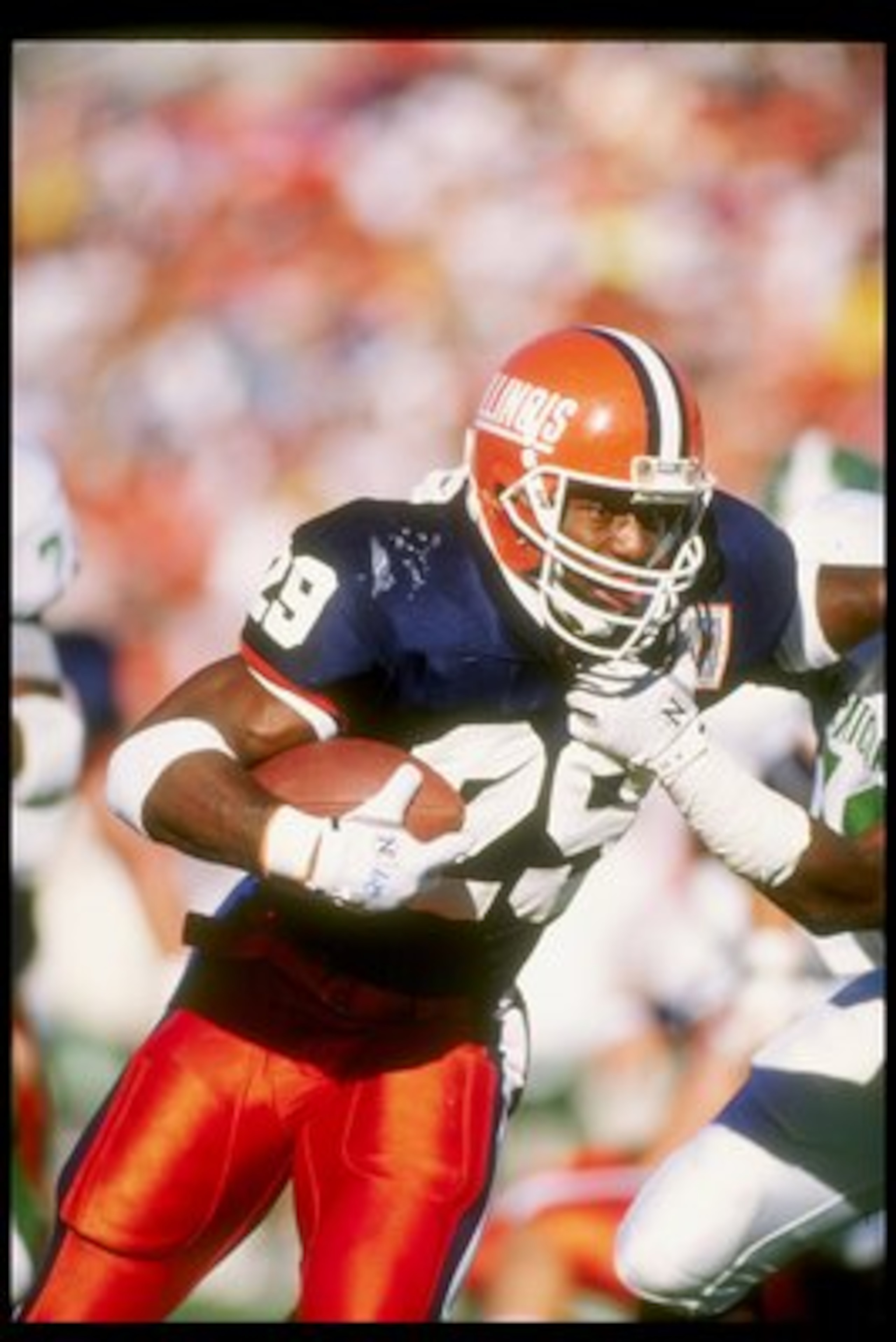 27 Oct 1990: Running back Howard Griffith of the Illinois Fighting Illini looks on during a game against the Michigan State Spartans. The Illinois Fighting Illini won the game 15-13.