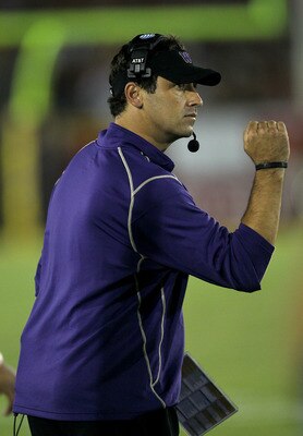 LOS ANGELES, CA - OCTOBER 02:  Head coach Steve Sarkisian of the Washington Huskies pumps his fist after a Huskies field goal in the third quarter against the USC Trojans at the  Angeles Memorial Coliseum on October 2, 2010 in Los Angeles, California.  Wa