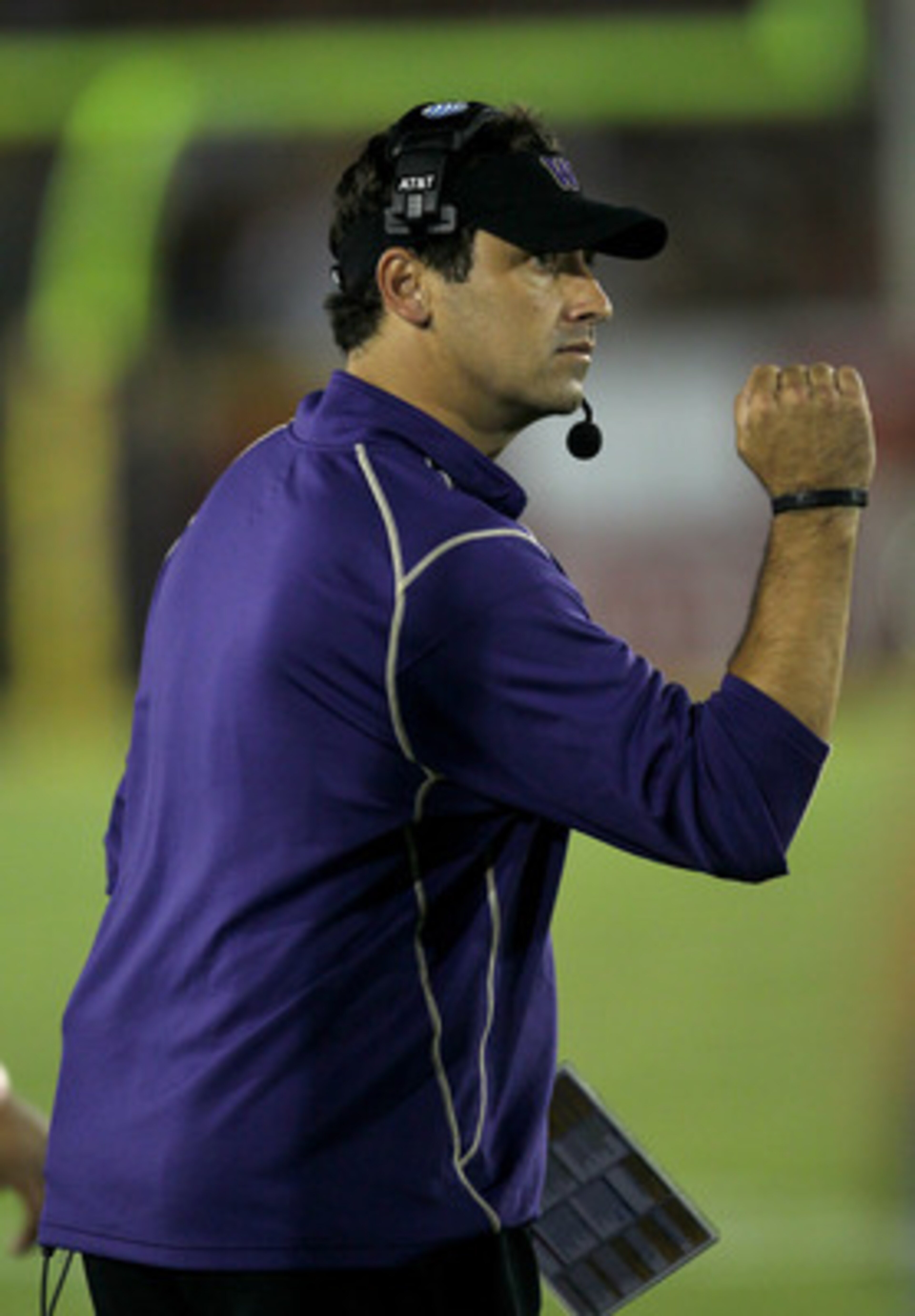 LOS ANGELES, CA - OCTOBER 02:  Head coach Steve Sarkisian of the Washington Huskies pumps his fist after a Huskies field goal in the third quarter against the USC Trojans at the  Angeles Memorial Coliseum on October 2, 2010 in Los Angeles, California.  Wa
