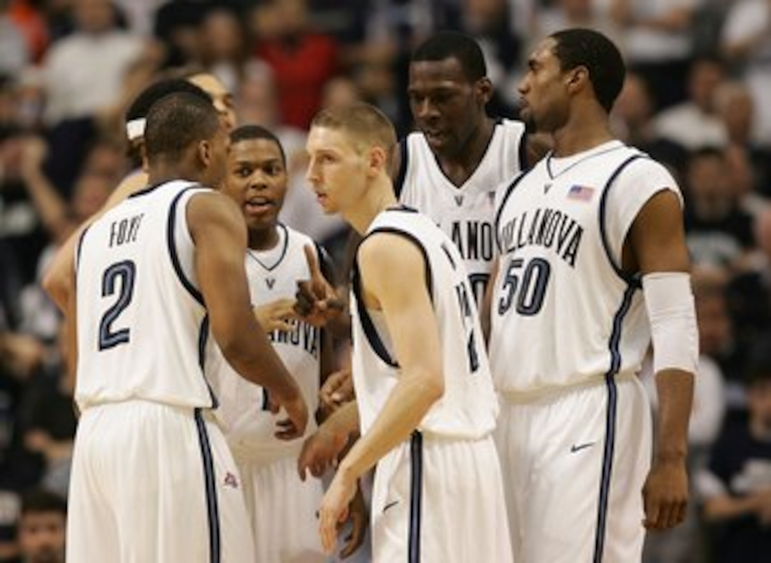 MINNEAPOLIS, MN - MARCH 26:  (L-R) Randy Foye #2, Kyle Lowry #1, Mike Nardi #12, Jason Fraser #20 and Will Sheridan #50 of the Villanova Wildcats huddle up against the Florida Gators during their Minneapolis Regional Final of the 2006 NCAA Divison I Men's