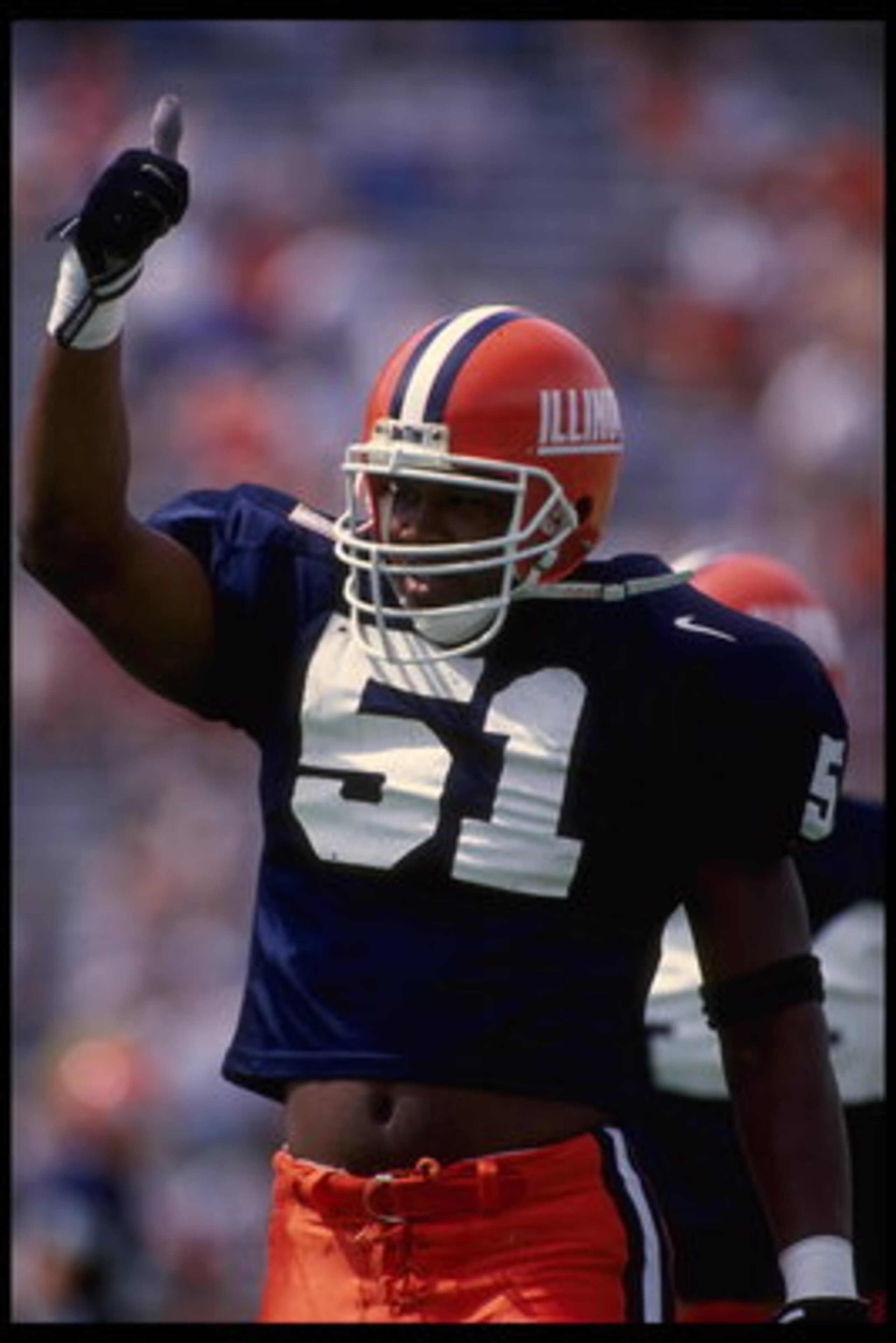 2 Sep 1995:  Linebacker Kevin Hardy of the University of Illinois gives a thumbs-up during the Fighting Illini 38-14 loss to the University of Michigan at Memorial Stadium in Champaign, Illinois.  Mandatory Credit:  Brian Bahr/Allsport