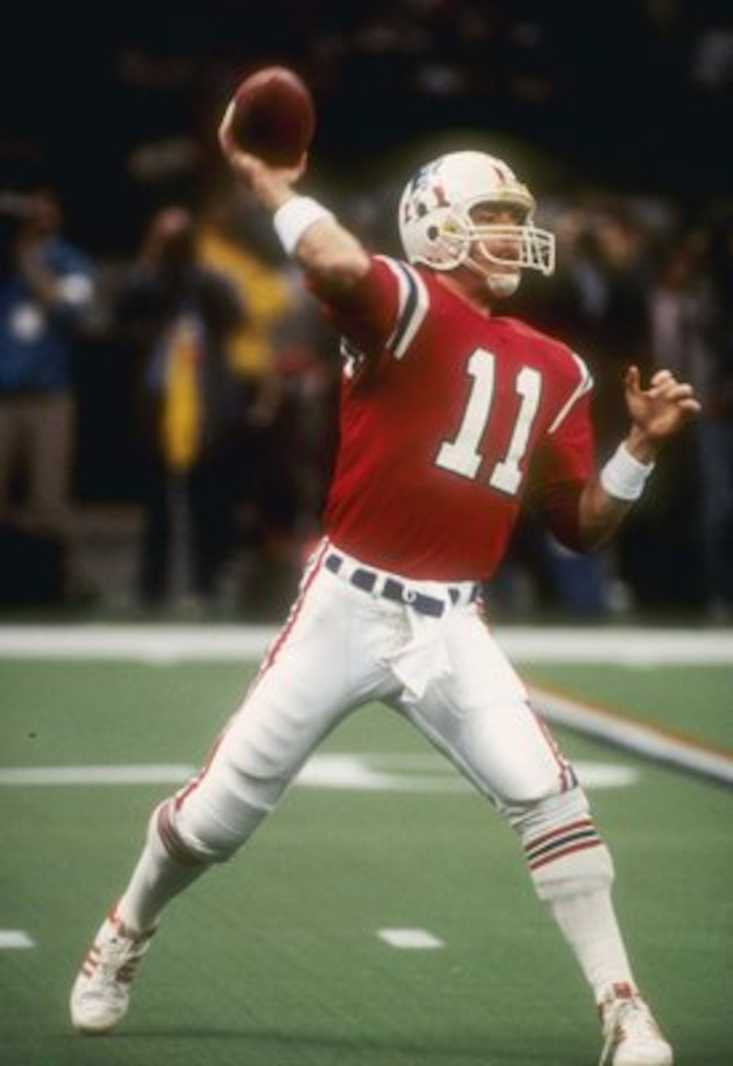 26  Jan 1986:   Quarterback Tony Eason of the New England Patriots tosses the football during the the Super Bowl  XX  game with the Chicago Bears at the Louisiana Superdome in New Orleans, Louisiana.  The Bears won the game, 46-10.   Mandatory Credit: All