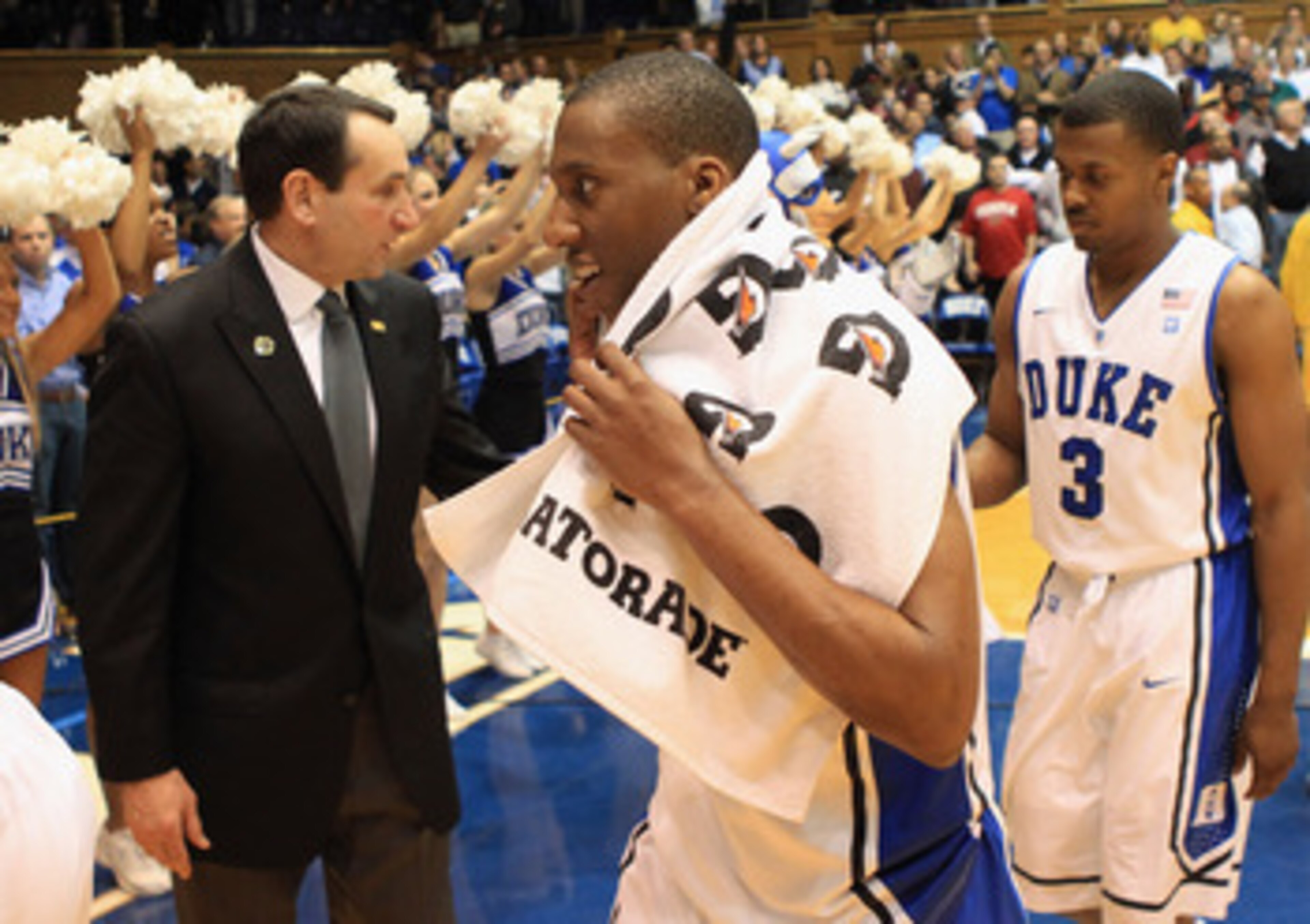DURHAM, NC - FEBRUARY 23: Head coach Mike Krzyzewski congratulates players Nolan Smith #2 and Tyler Thornton #3 of the Duke Blue Devils after their 78-61 victory over the Temple Owls at Cameron Indoor Stadium on February 23, 2011 in Durham, North Carolin DURHAM, NC - FEBRUARY 23: Head coach Mike Krzyzewski congratulates players Nolan Smith #2 and Tyler Thornton #3 of the Duke Blue Devils after their 78-61 victory over the Temple Owls at Cameron Indoor Stadium on February 23, 2011 in Durham, North Carolin