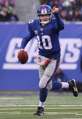 EAST RUTHERFORD, NJ - DECEMBER 19:  Eli Manning #10 of the New York Giants passes against the Philadelphia Eagles at New Meadowlands Stadium on December 19, 2010 in East Rutherford, New Jersey.  (Photo by Nick Laham/Getty Images)