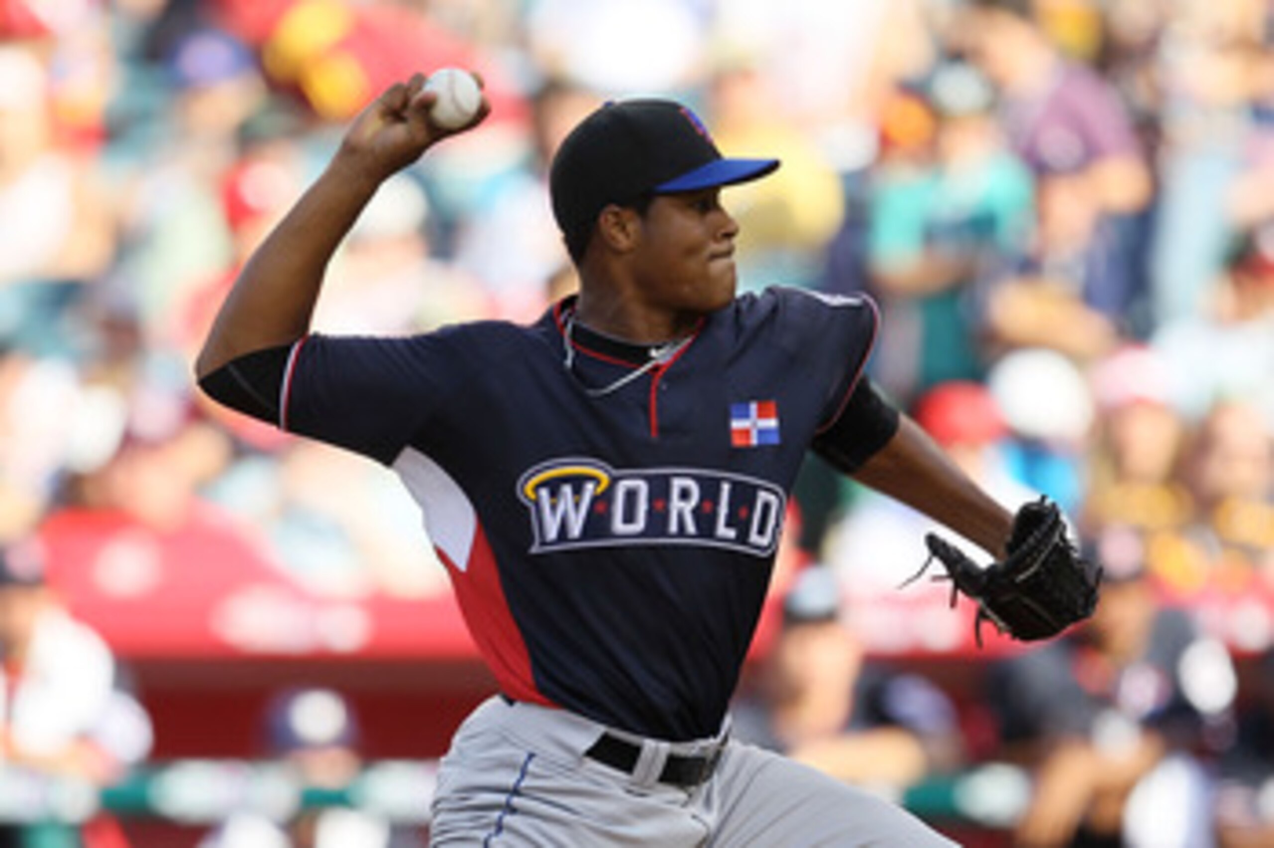 ANAHEIM, CA - JULY 11:  World Futures All-Star Stolmy Pimentel #45 of the Boston Red Sox throws a pitch during the 2010 XM All-Star Futures Game at Angel Stadium of Anaheim on July 11, 2010 in Anaheim, California.  (Photo by Stephen Dunn/Getty Images)