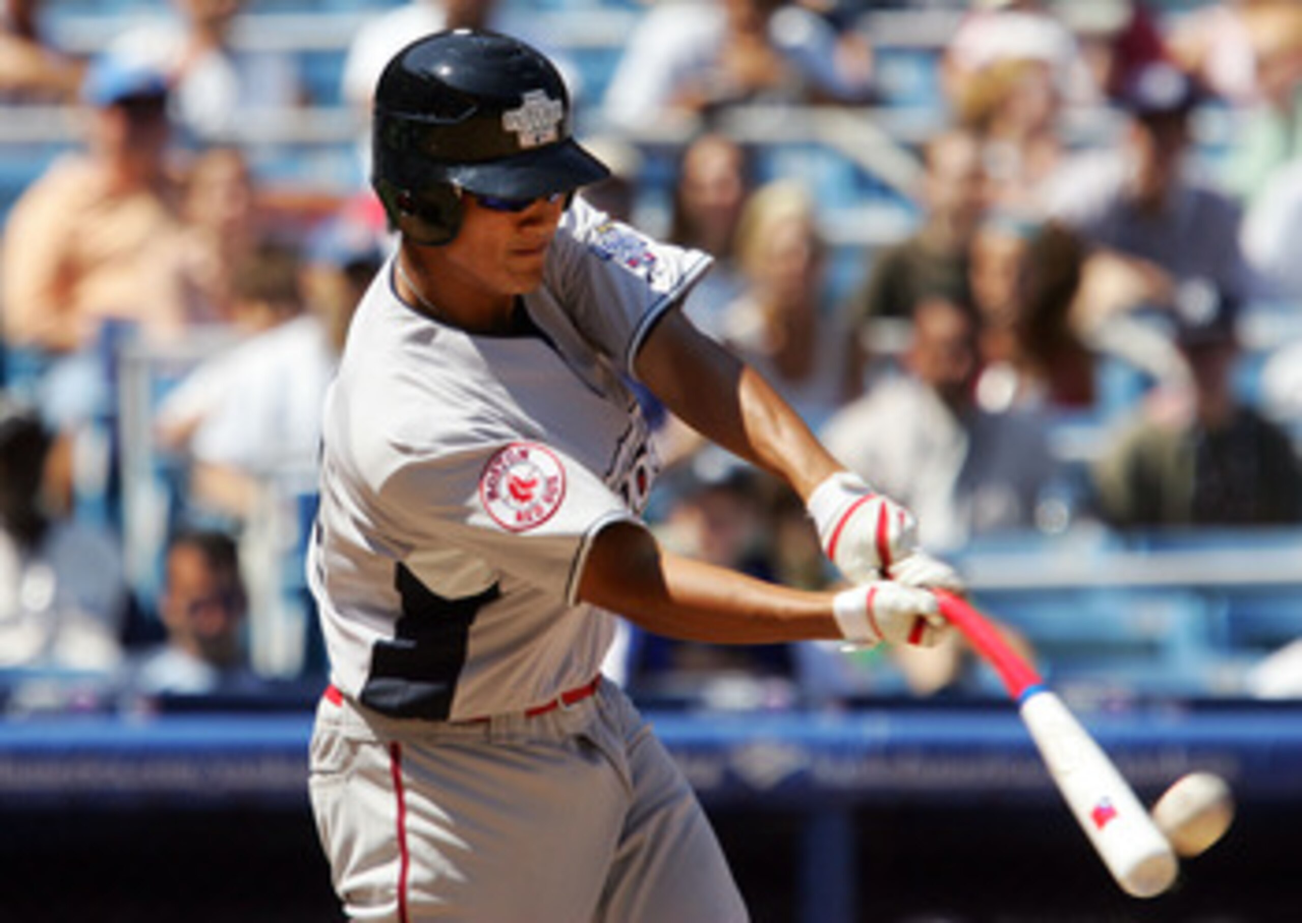 NEW YORK - JULY 13:  Che-Hsuan Lin #24 of the Boston Red Sox playing for the World Futures Team hits a single in the ninth inning against the United States Olympic team during the 2008 XM All-Star Futures Game at Yankee Stadium on July 13, 2008 in the Bro