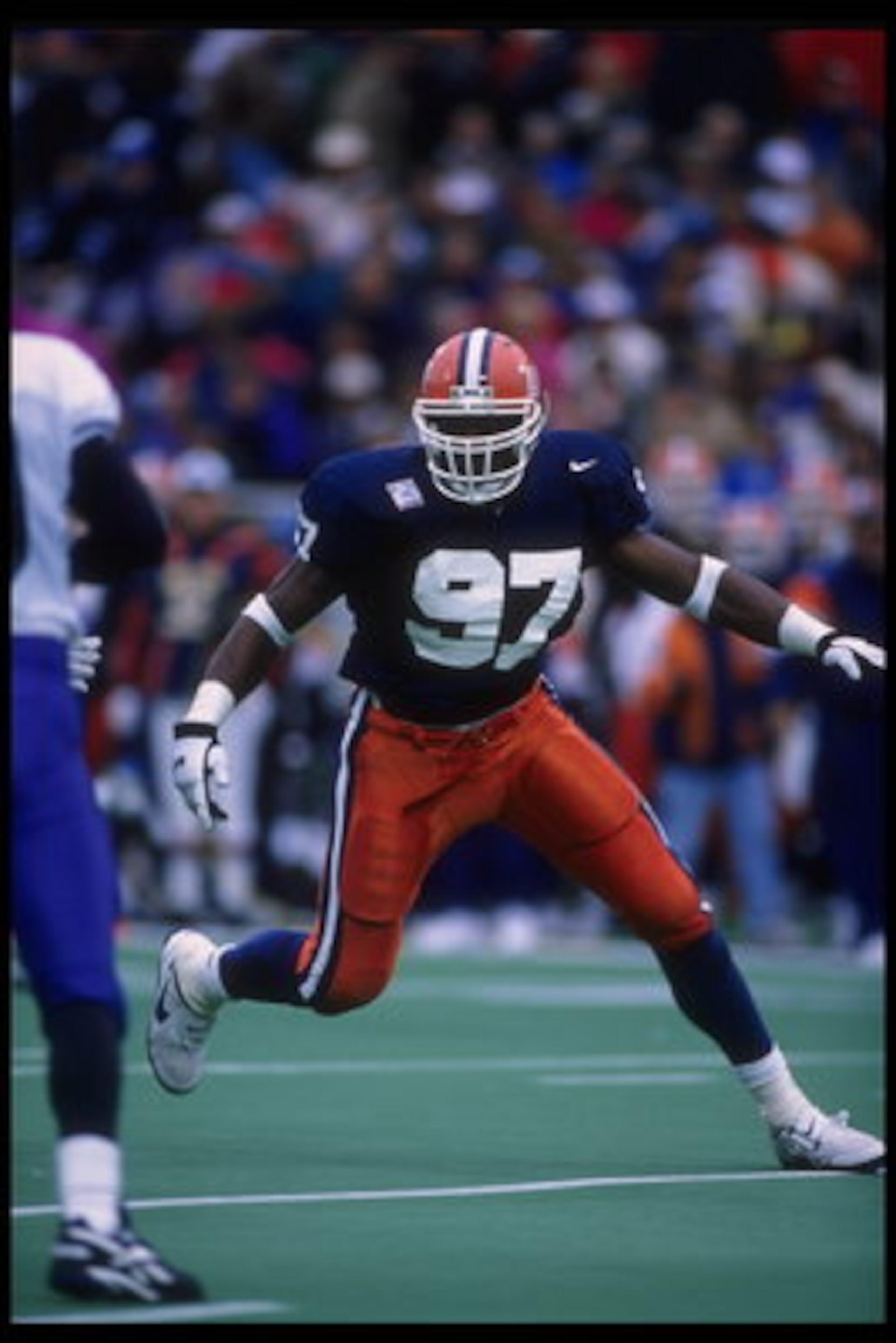 28 Oct 1995:  Linebacker Simeon Rice #97 of the Illinois Fighting Illini goes up against some Wildcats from Northwestern at Memorial Stadium in Champaign, Illinois.  Northwestern defeated Illinois 17-14.  Mandatory Credit:  Jonathan Daniel/Allsport